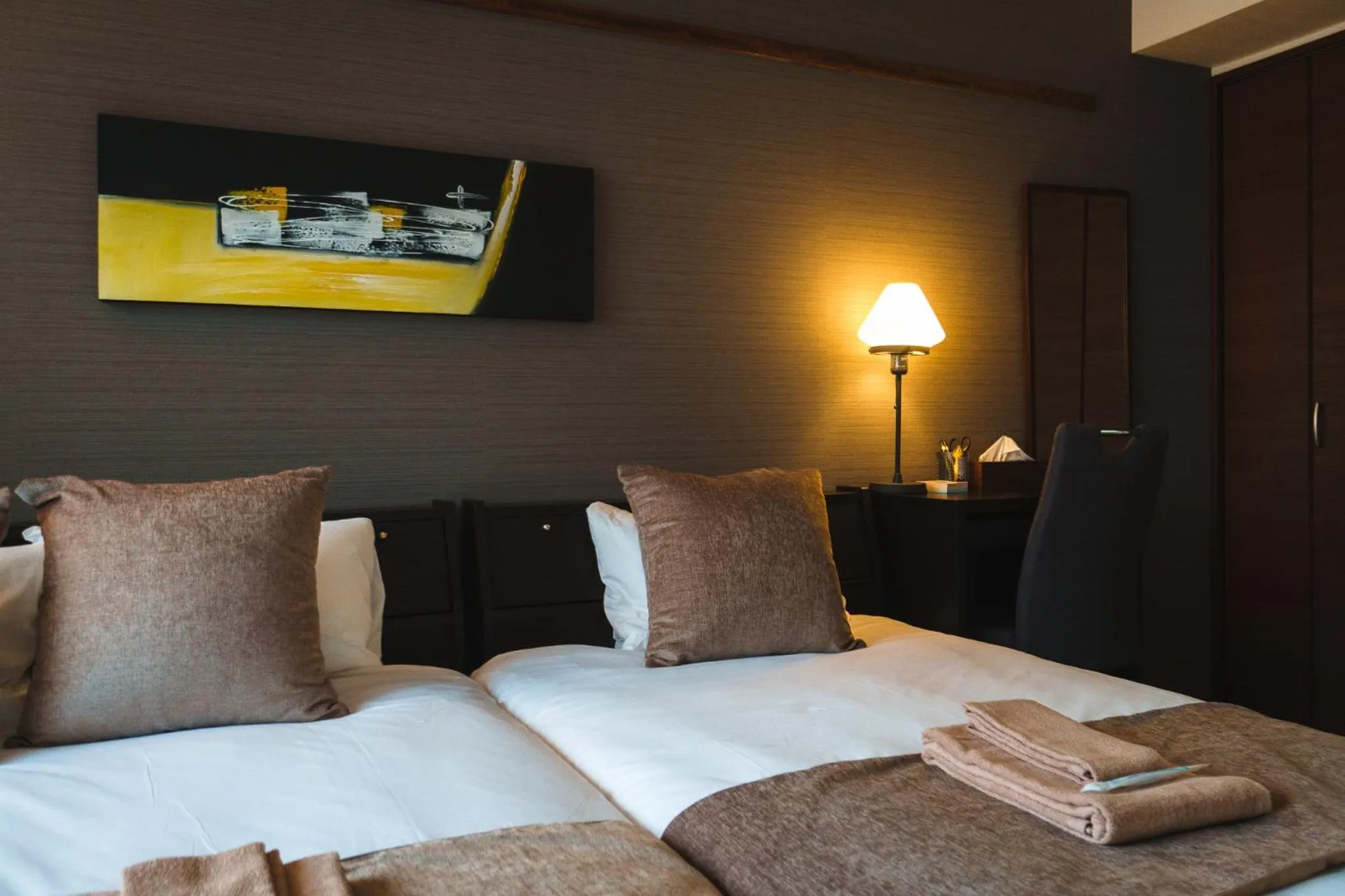 Bed in KINTARO Hotel Okinawa Naha