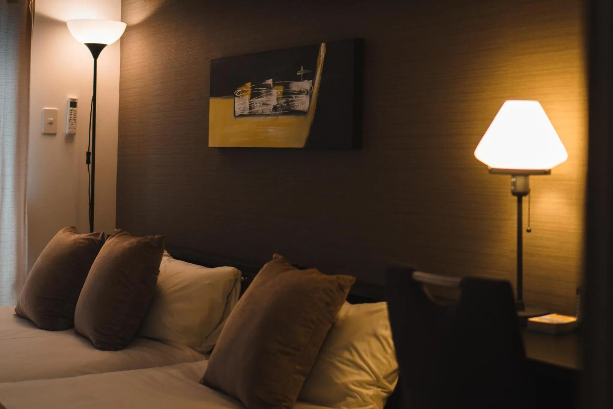 Bed in KINTARO Hotel Okinawa Naha