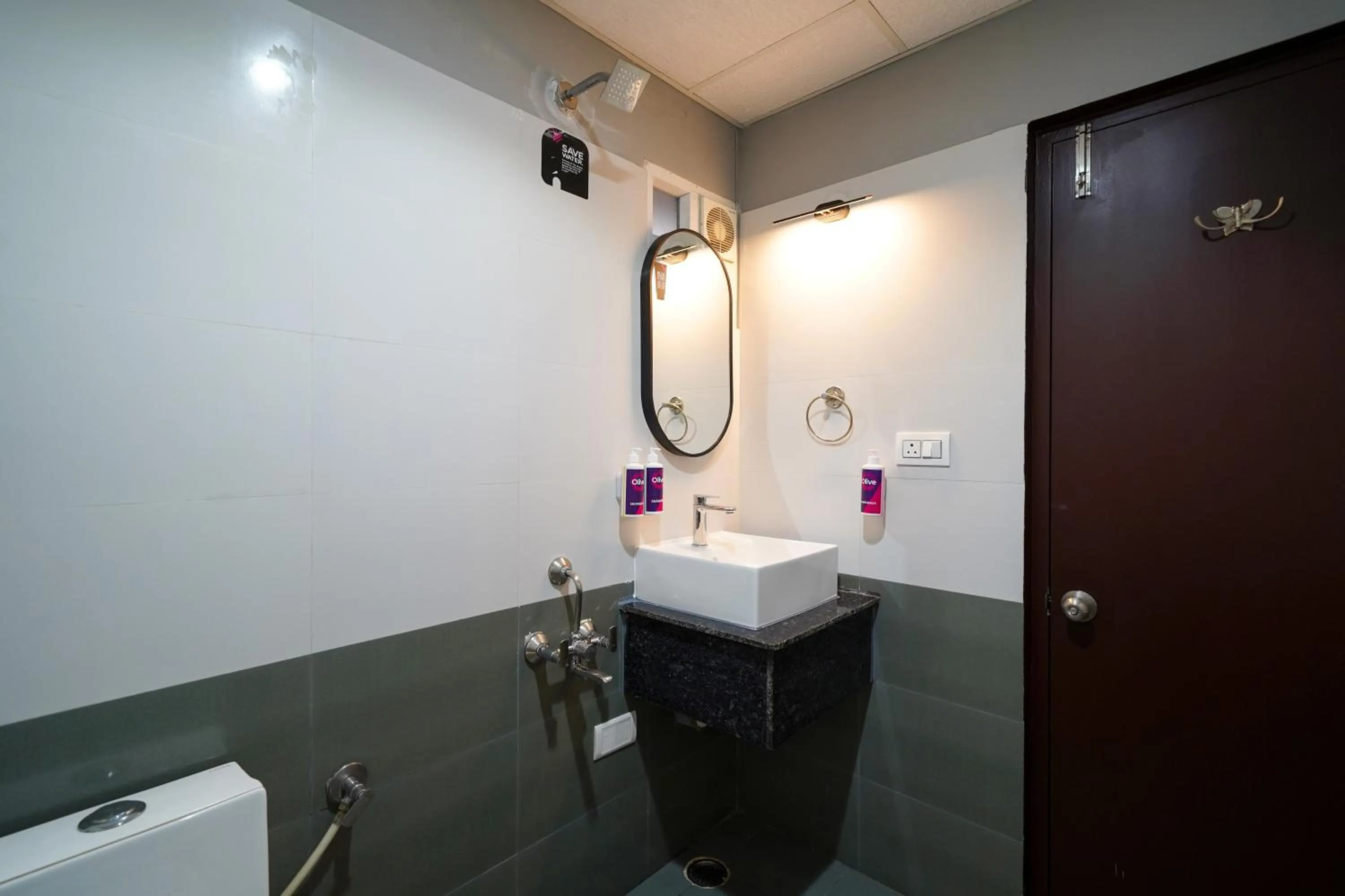 Toilet in Olive Hotel Hosa Road Metro by Embassy Group
