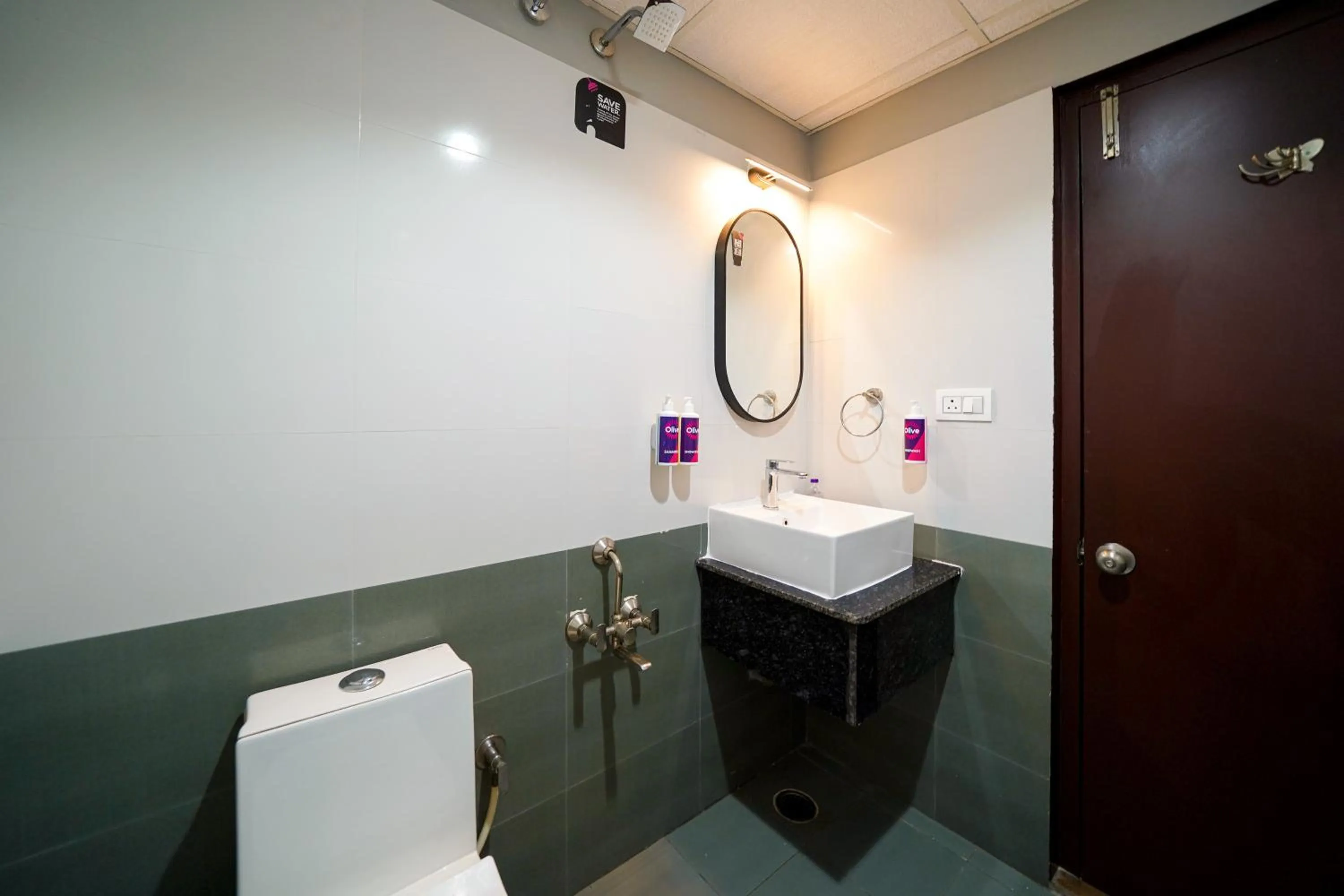 Toilet in Olive Hotel Hosa Road Metro by Embassy Group
