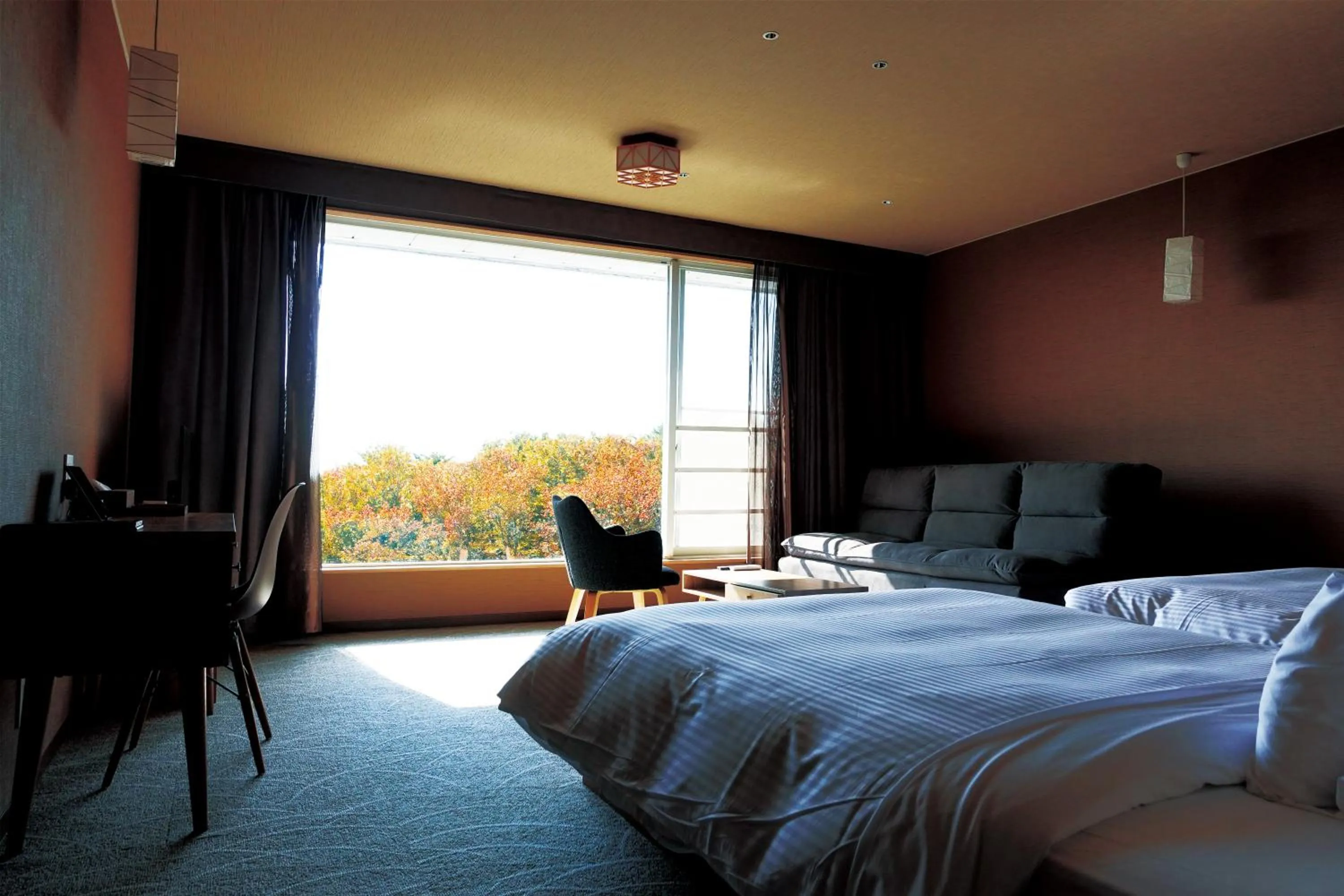 Bed in Resort Hotel RAKI House Nasu