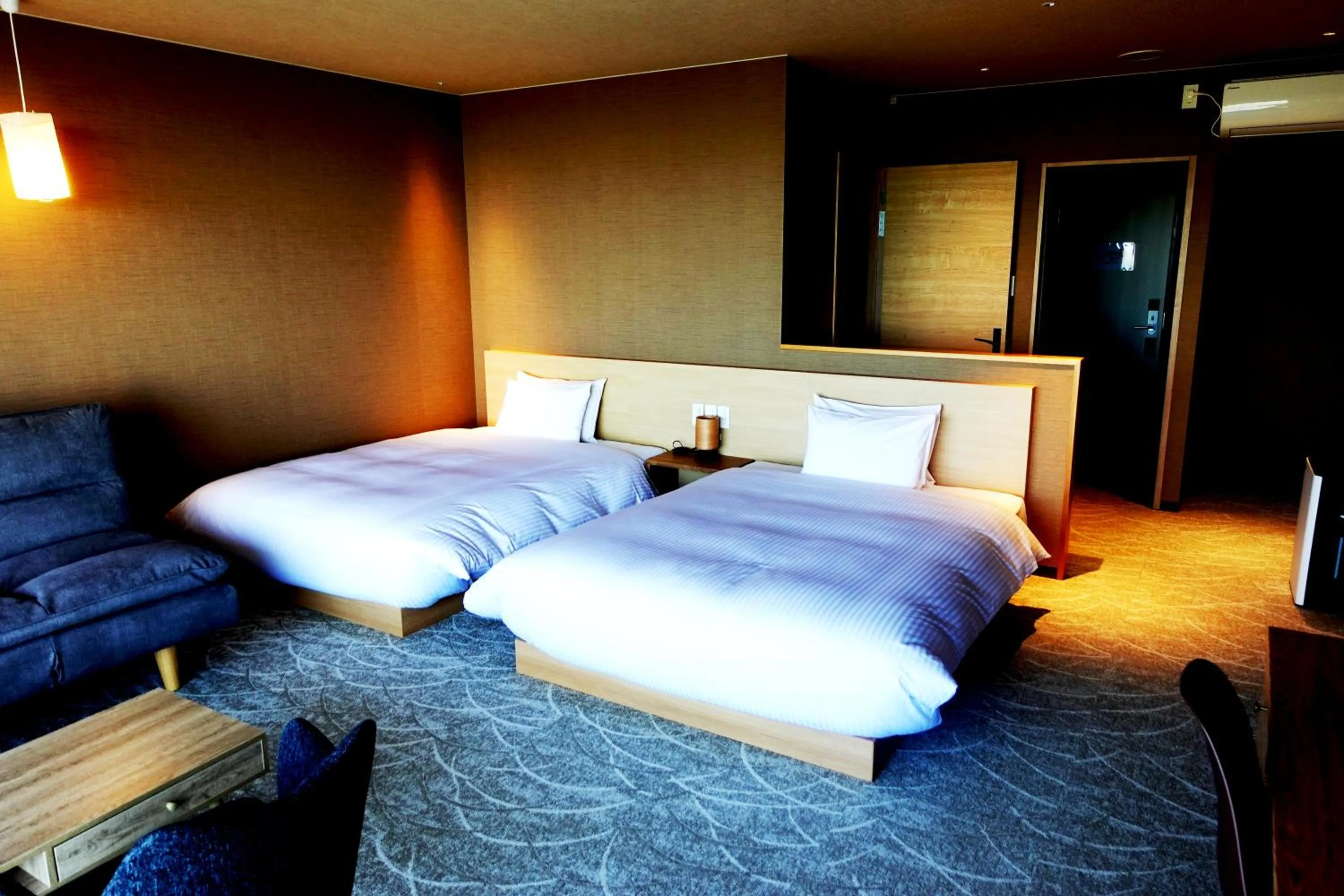 Bed in Resort Hotel RAKI House Nasu