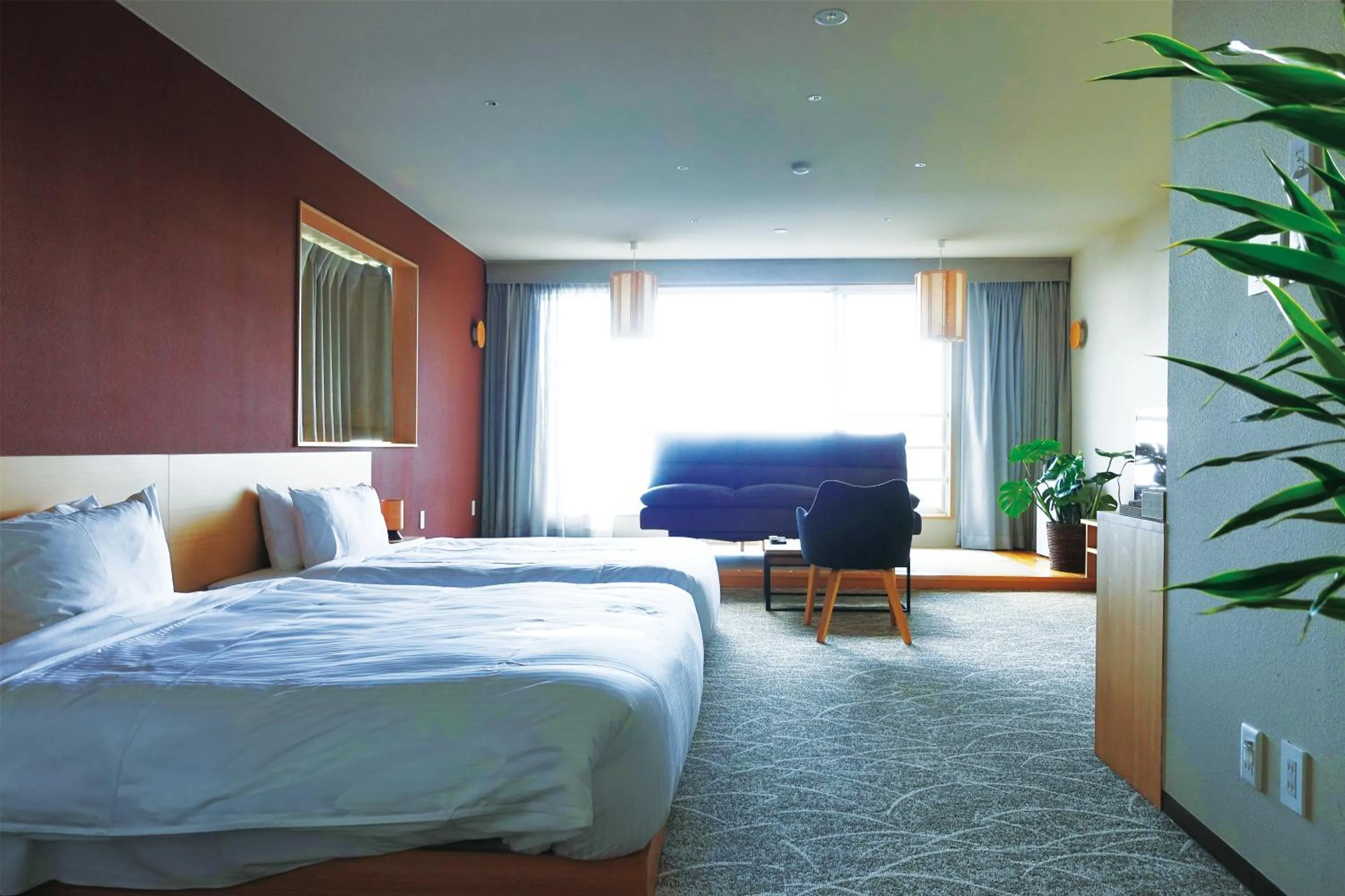 Communal lounge/ TV room, Bed in Resort Hotel RAKI House Nasu