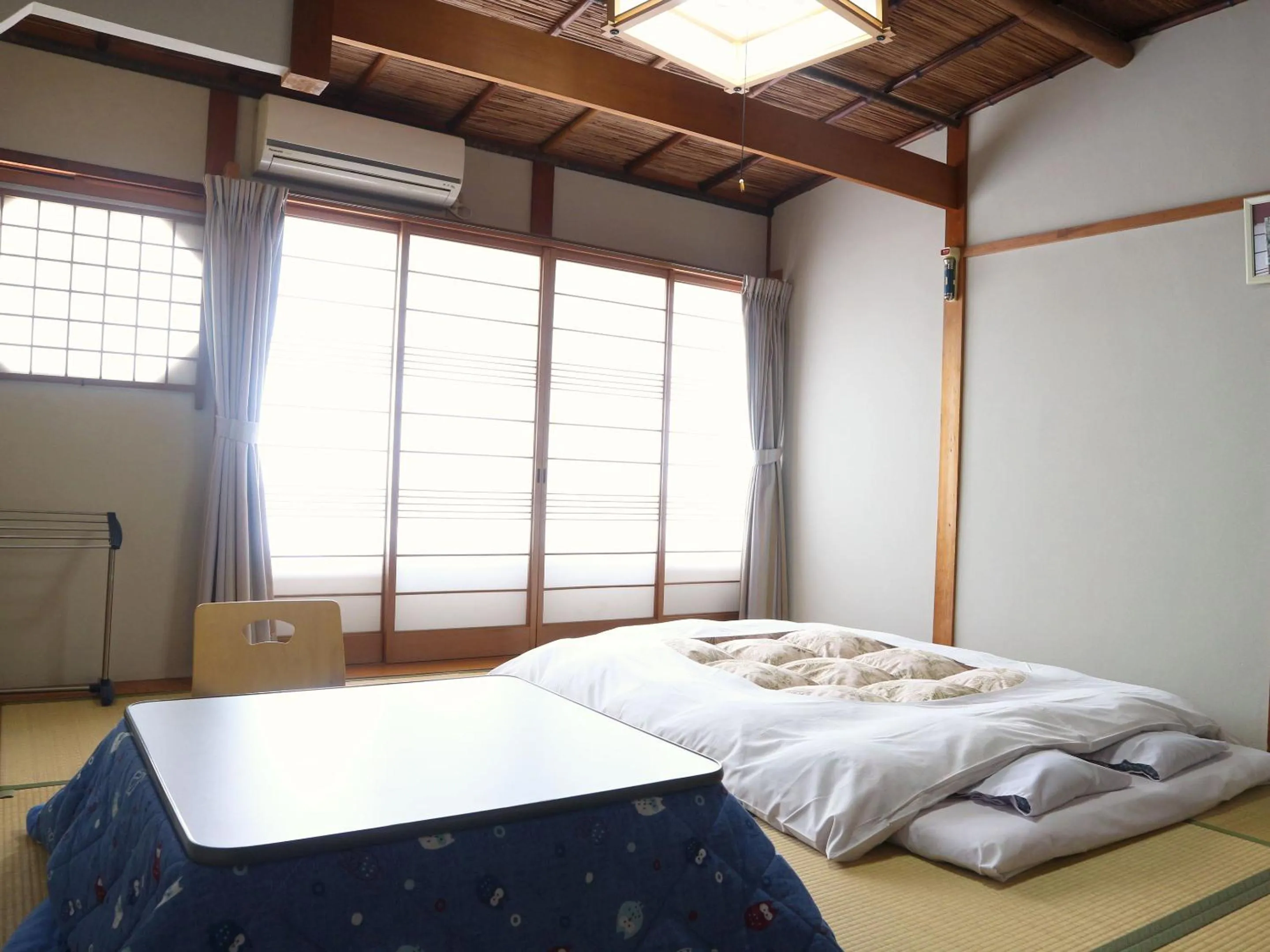 Photo of the whole room, Bed in Kanko Ryokan Yamato
