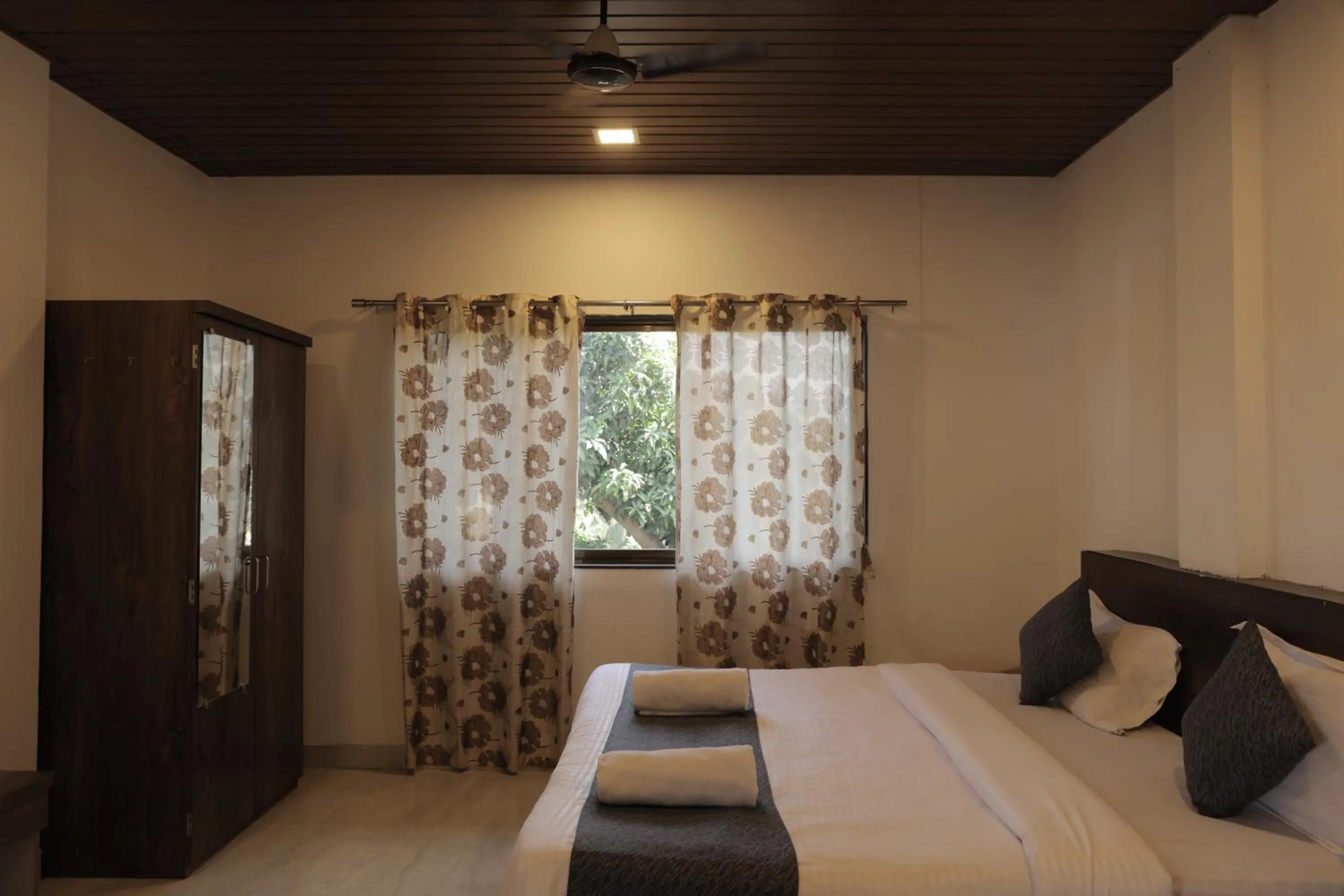 wardrobe, Bed in Anant Villa & Resorts