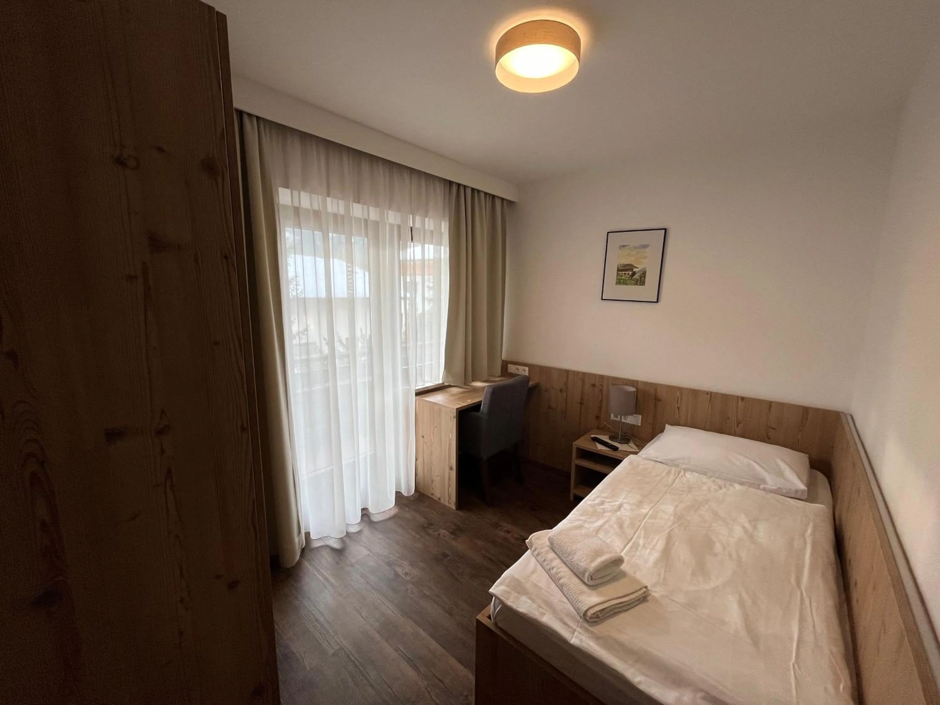 Bed in Pension Alpina