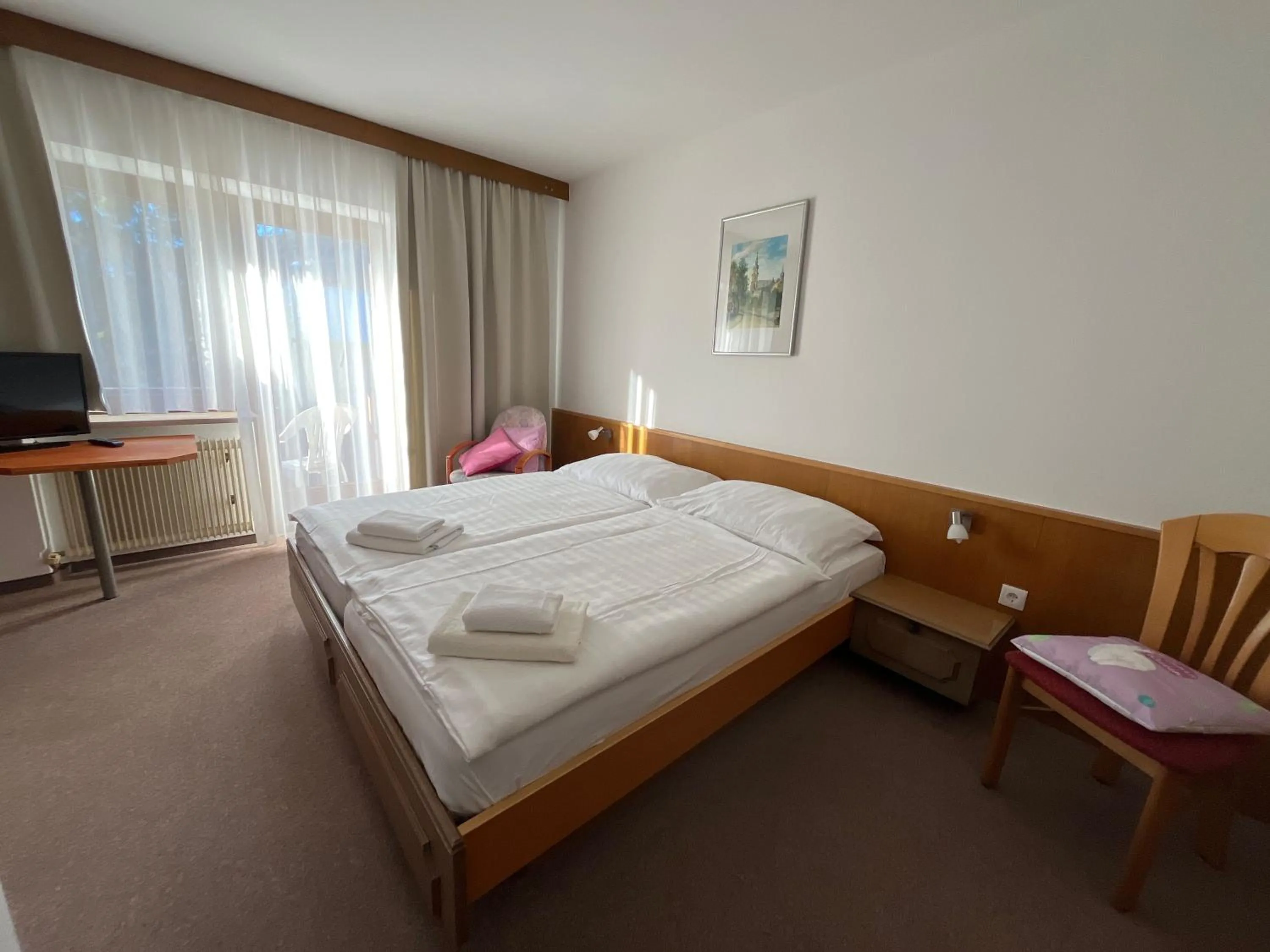 Bed in Pension Alpina