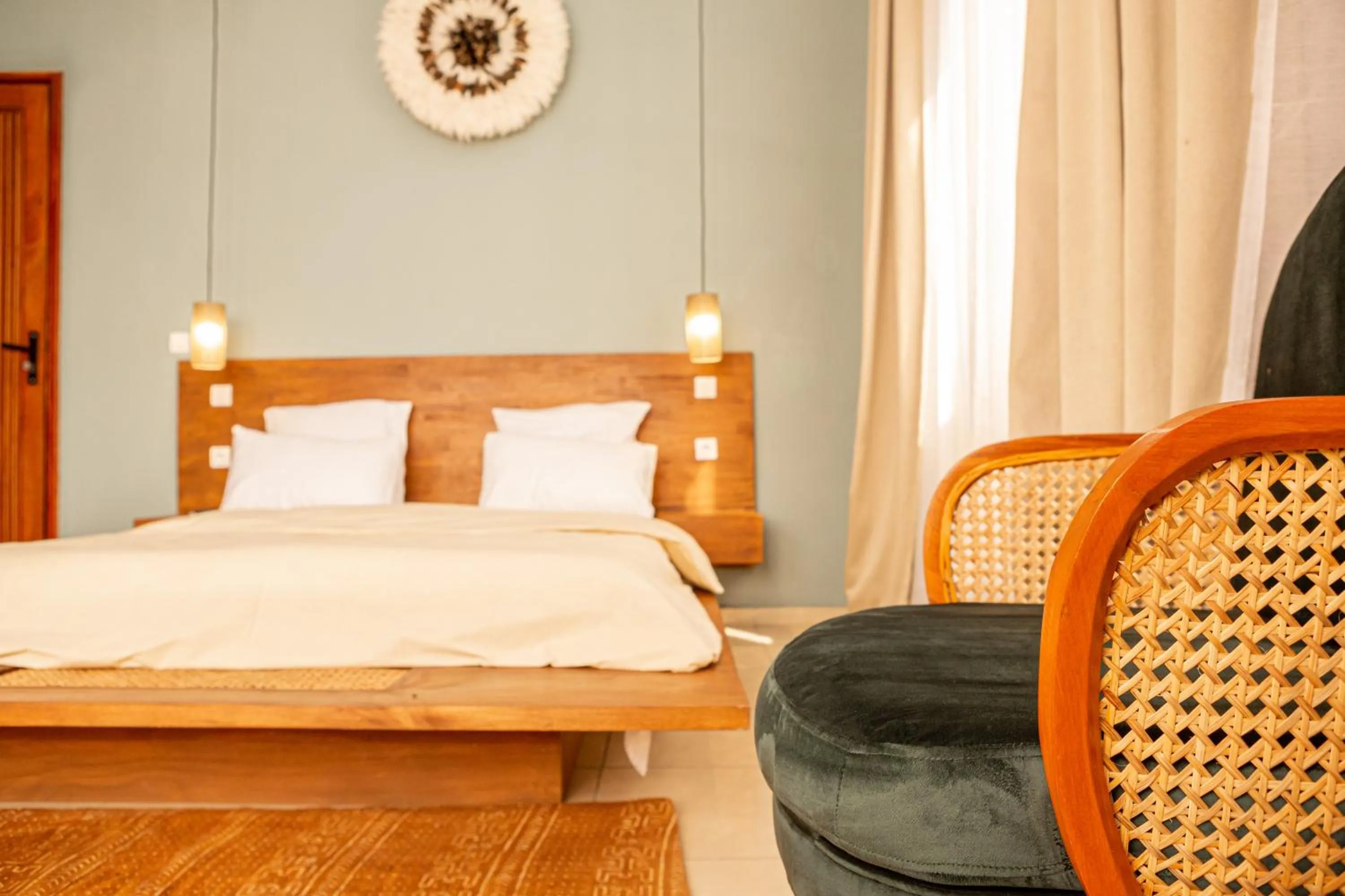 Bed in Tamarin Hôtel Cotonou