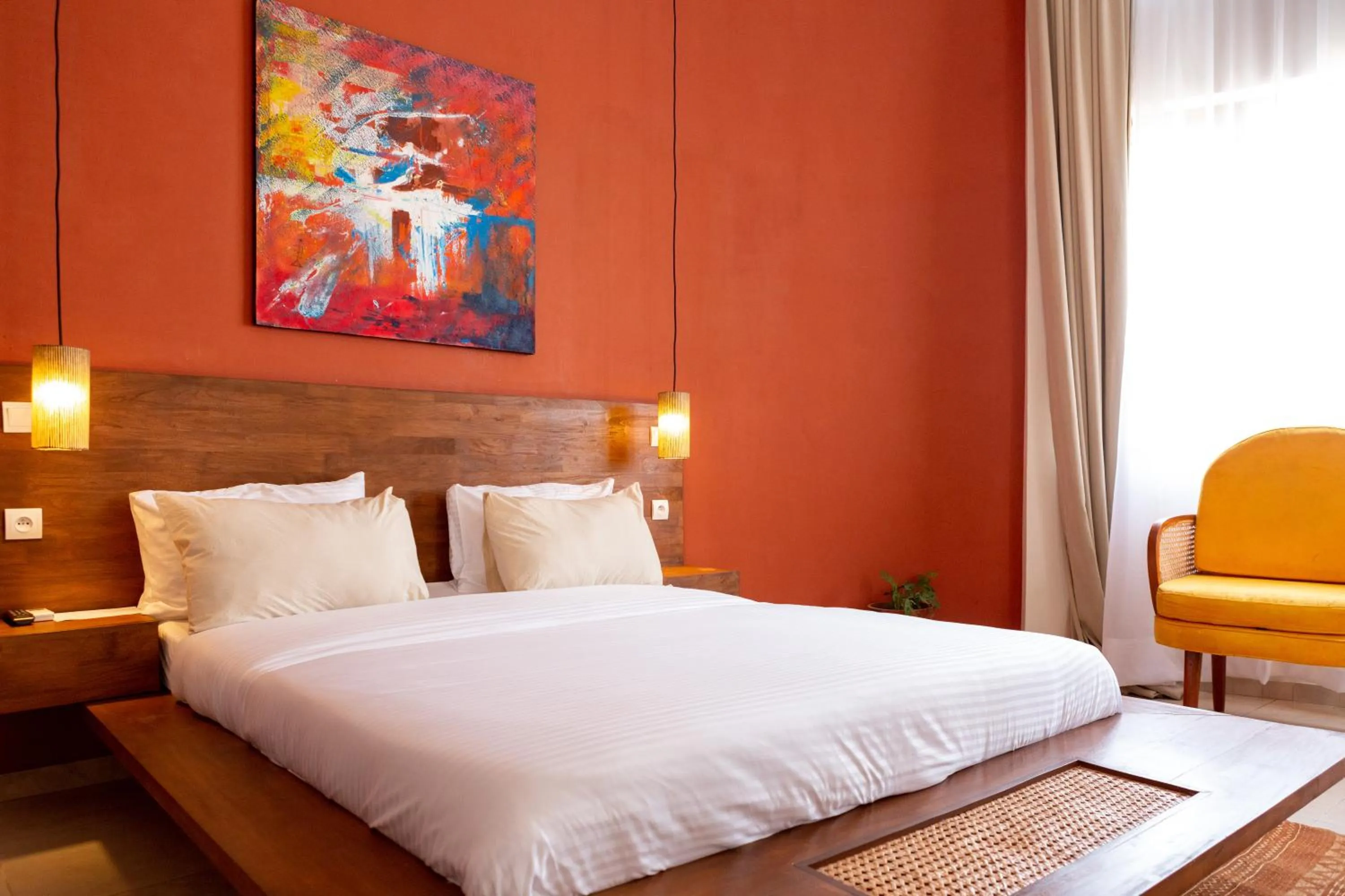 Bed in Tamarin Hôtel Cotonou