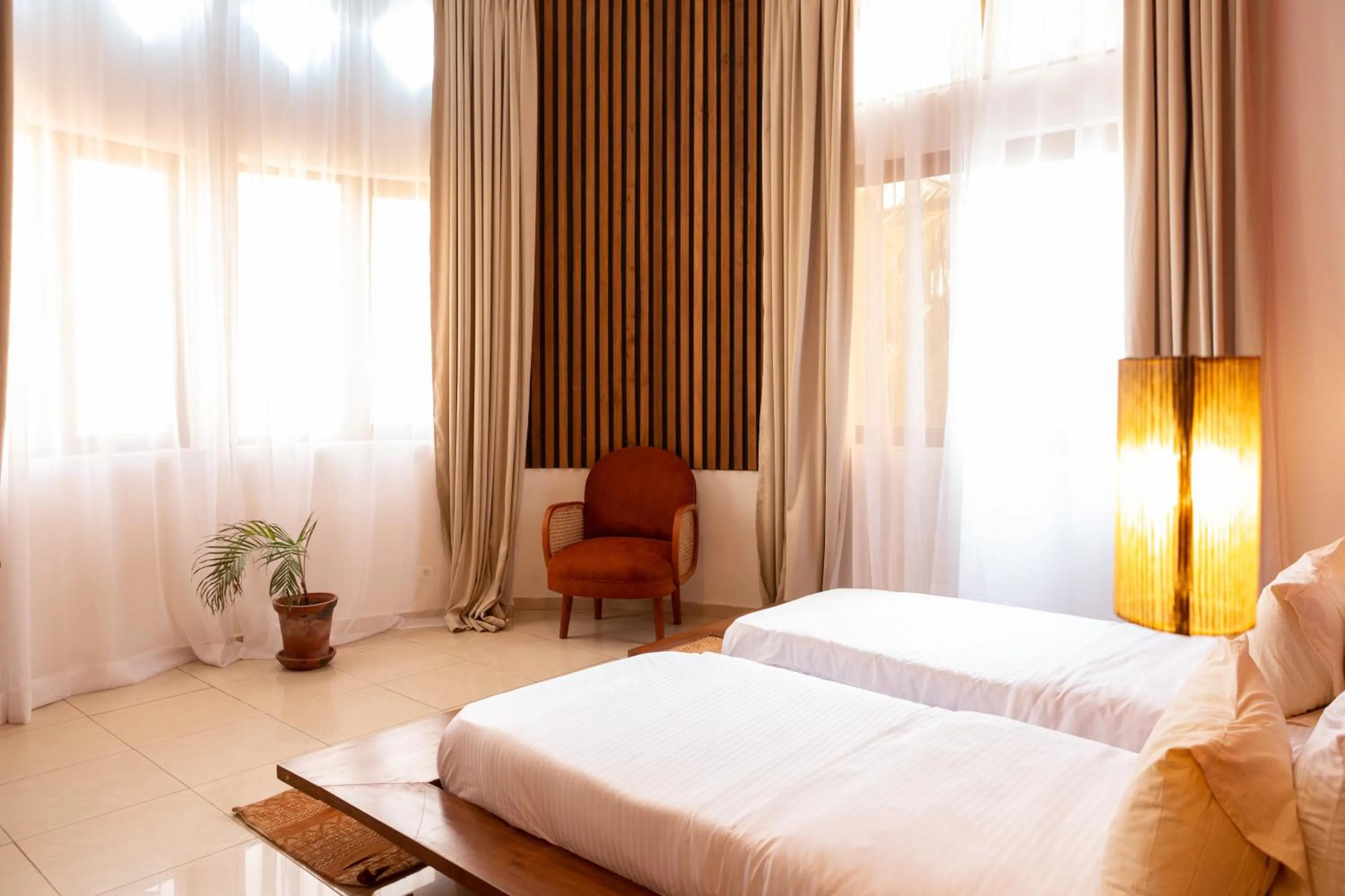 Bed in Tamarin Hôtel Cotonou