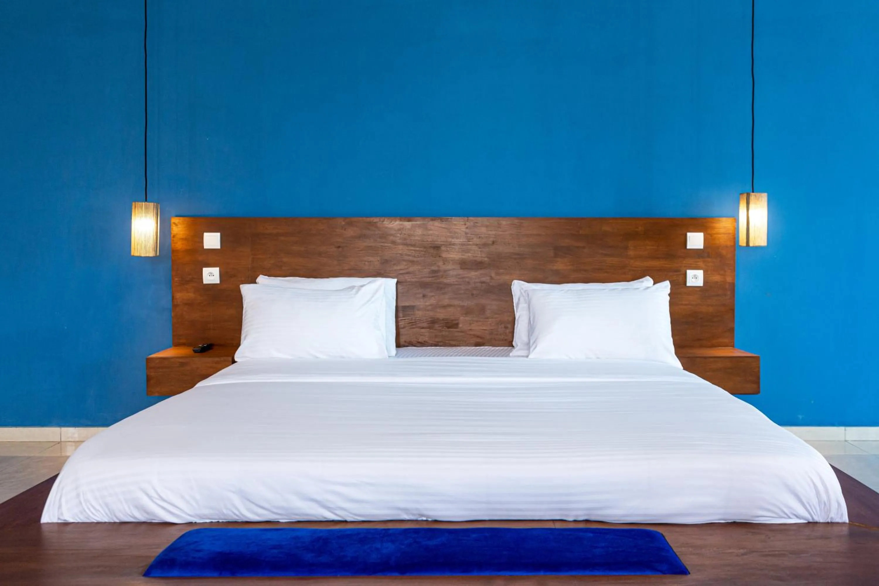 Bed in Tamarin Hôtel Cotonou