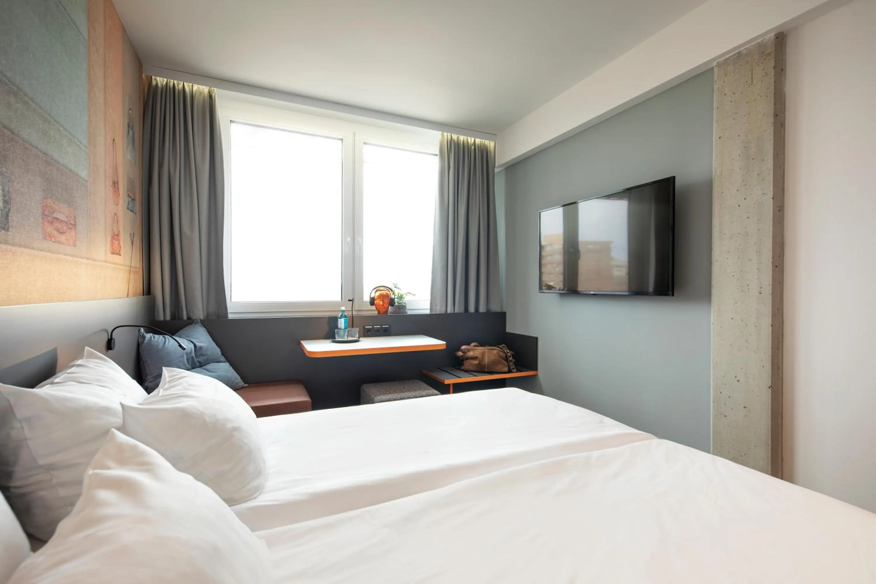 Photo of the whole room, Bed in LOGINN Hotel Offenbach