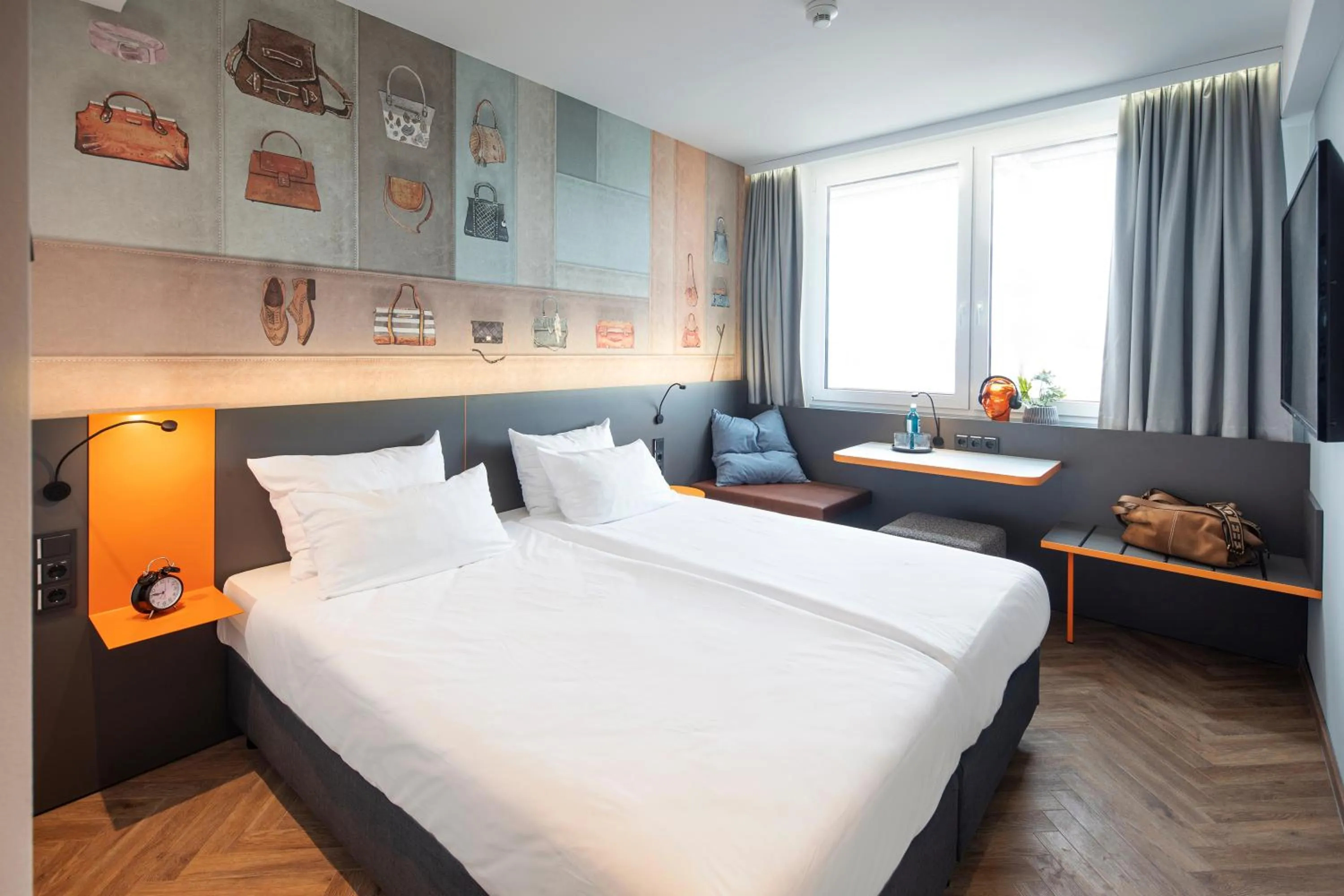 Photo of the whole room, Bed in LOGINN Hotel Offenbach