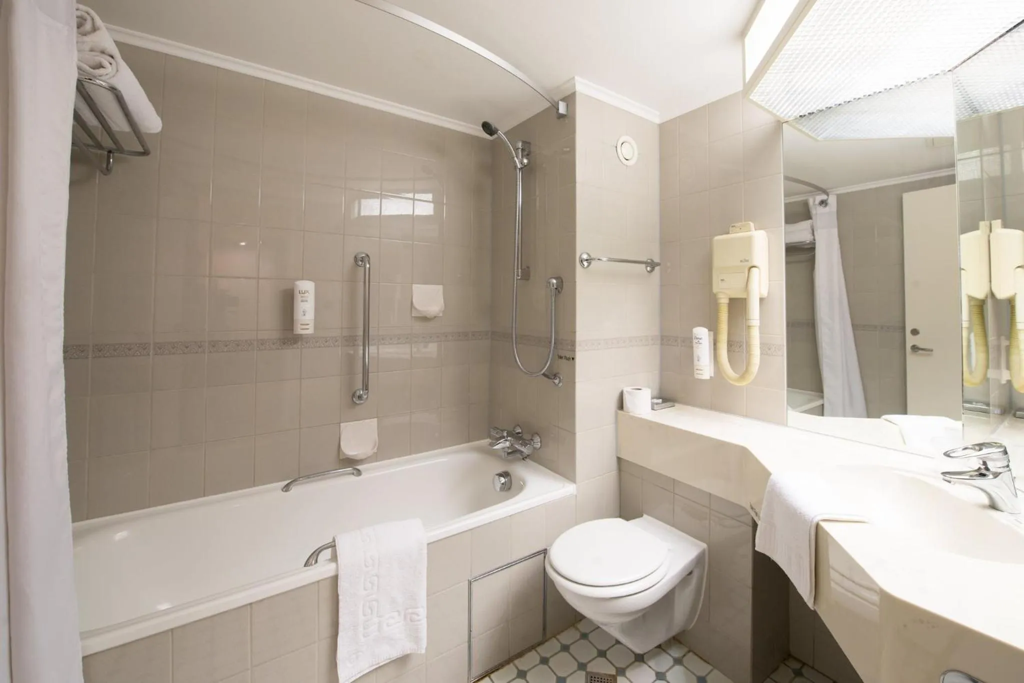 Bathroom in Holiday Inn Northampton by IHG