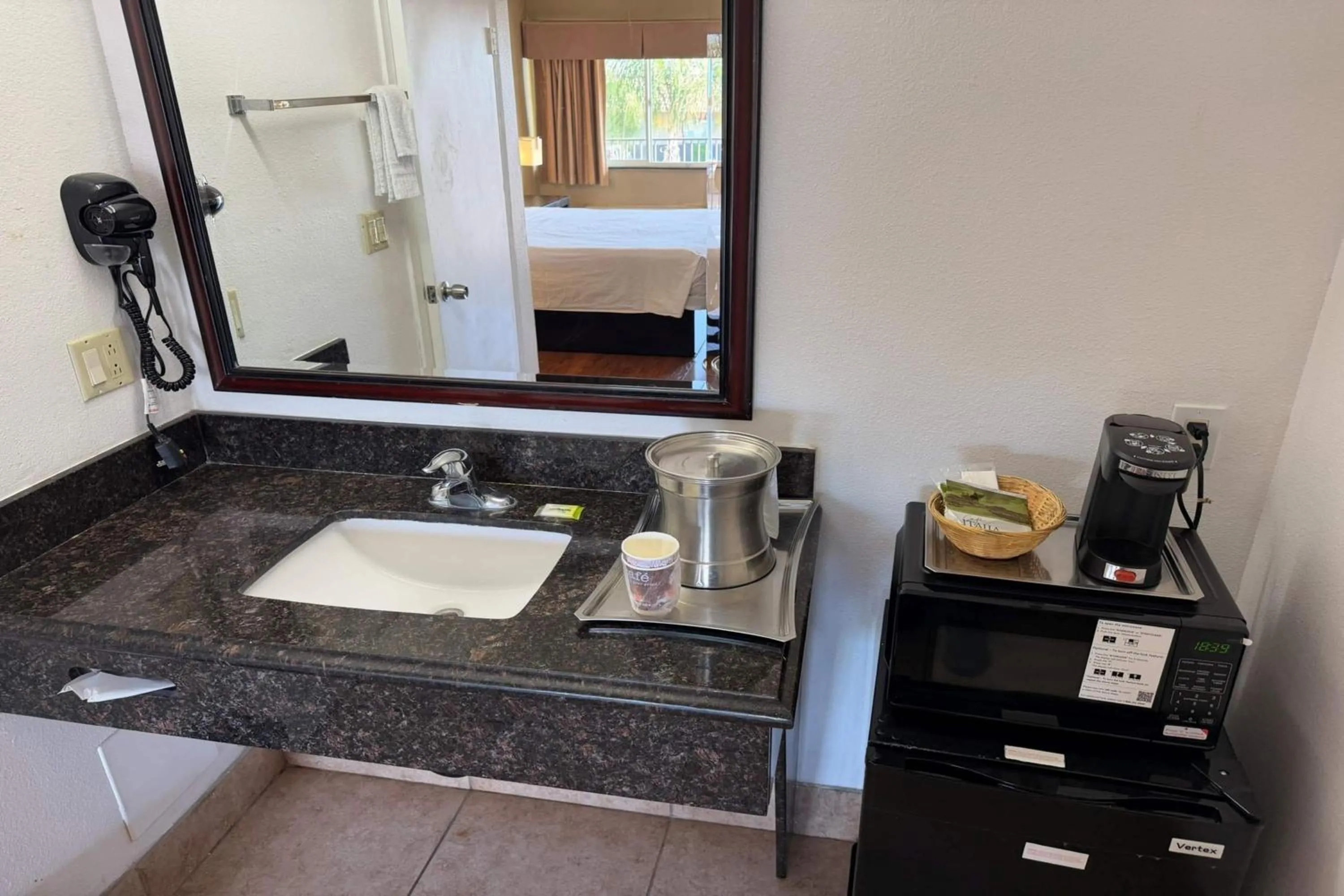 Bathroom in Travelodge by Wyndham Hemet CA