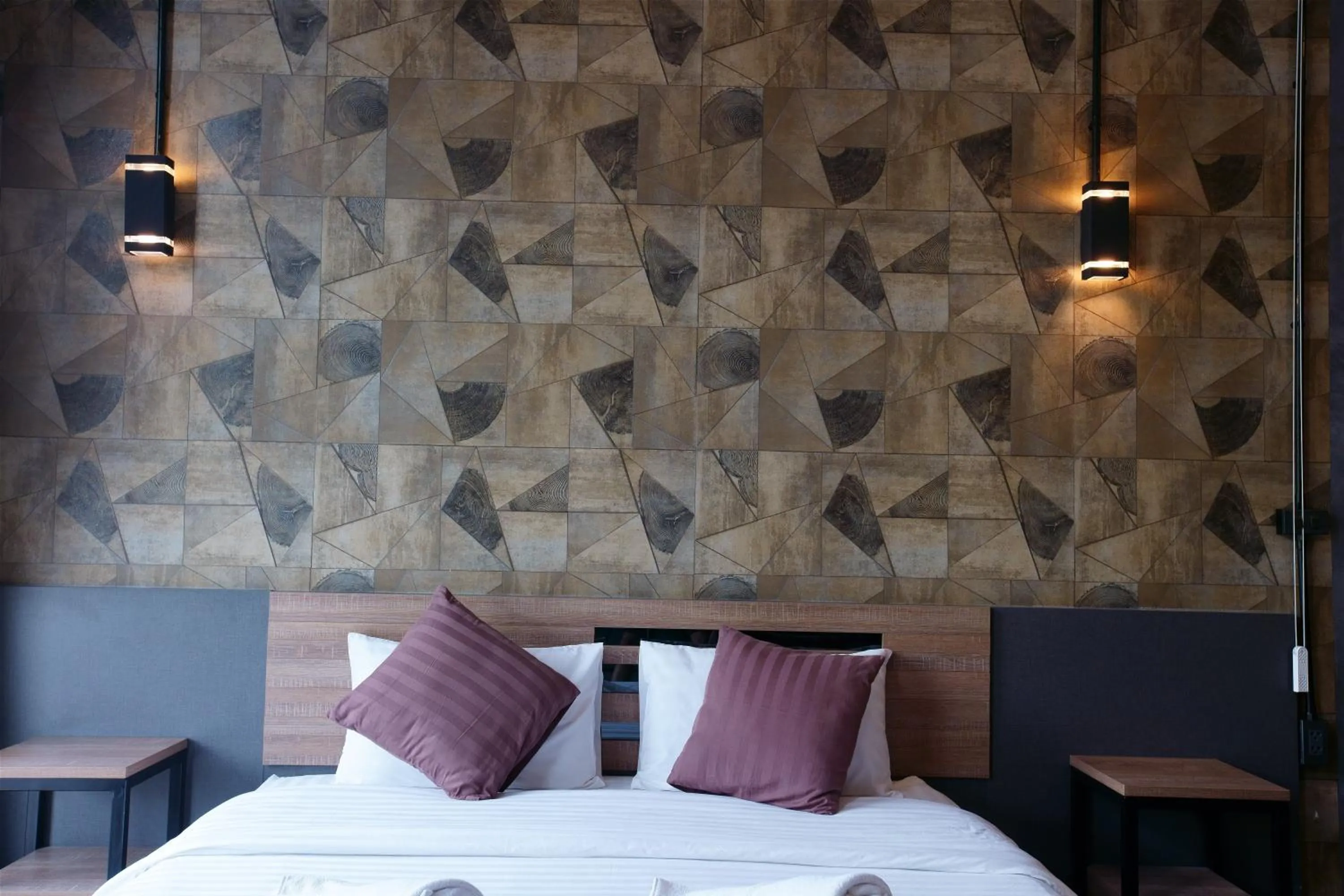 Bed in Kwai Tara Riverside Villas