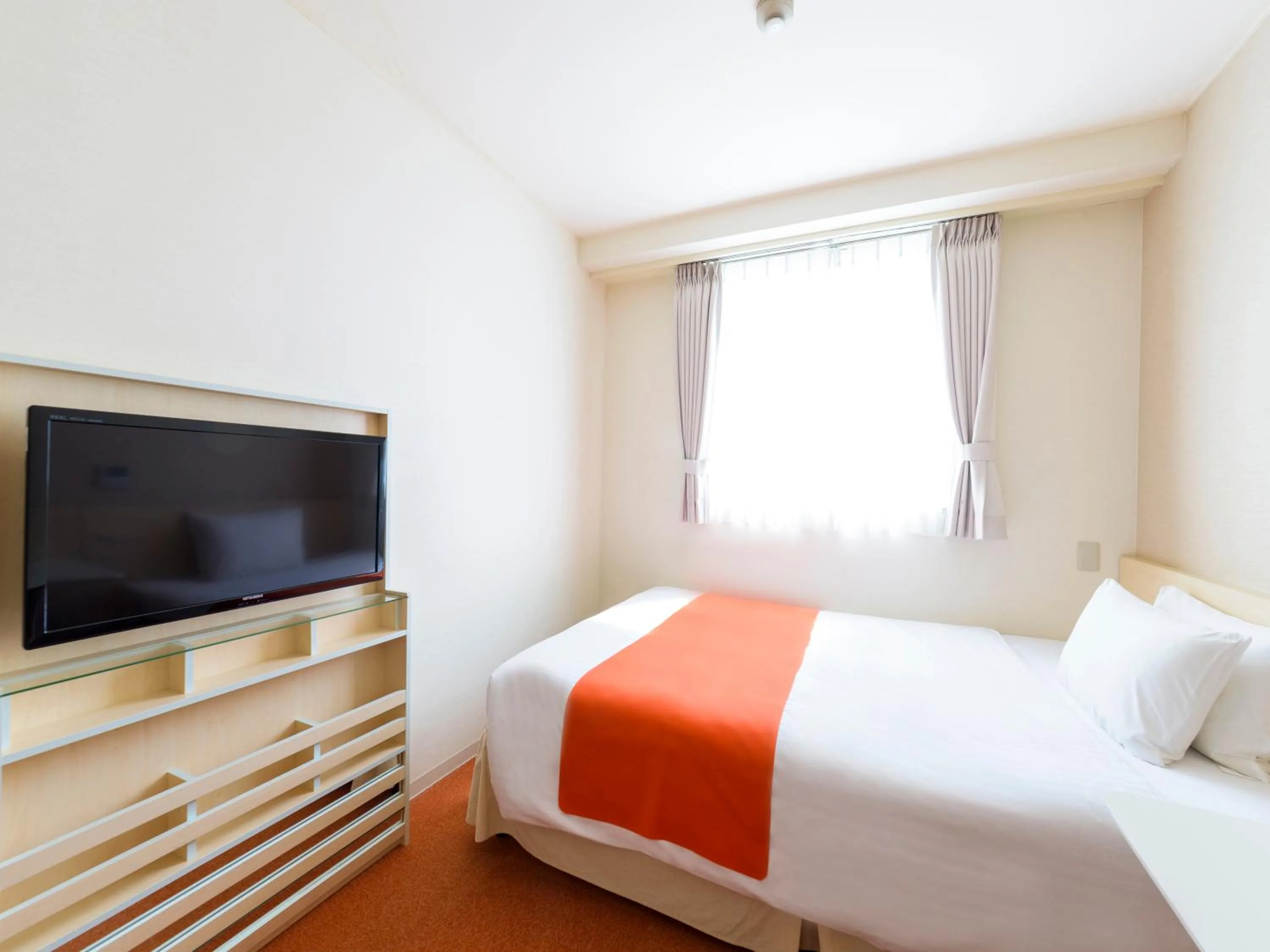 Bed in Hotel Abest Naha Kokusai Street