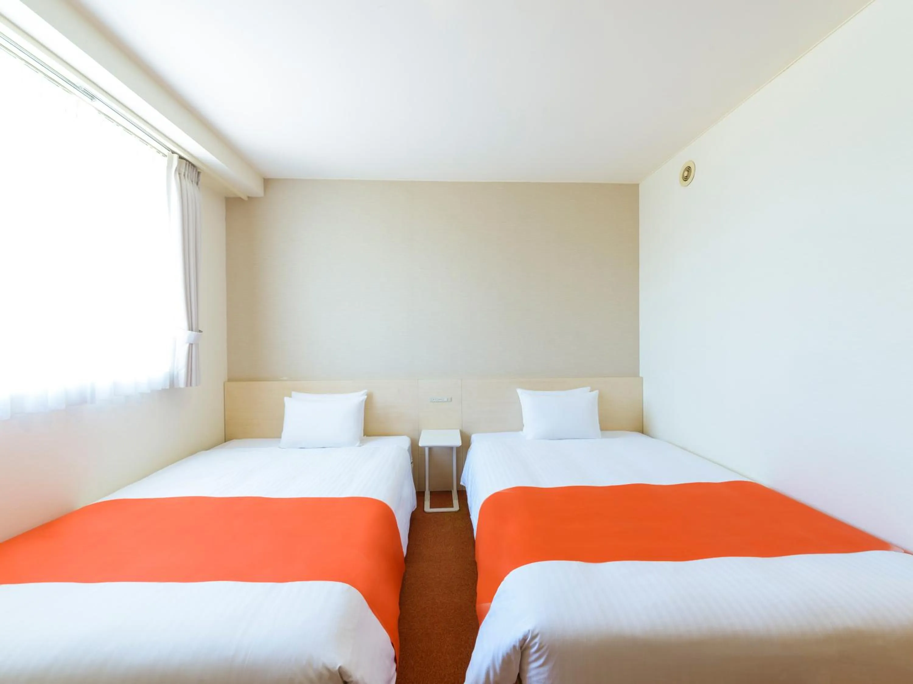 Photo of the whole room, Bed in Hotel Abest Naha Kokusai Street