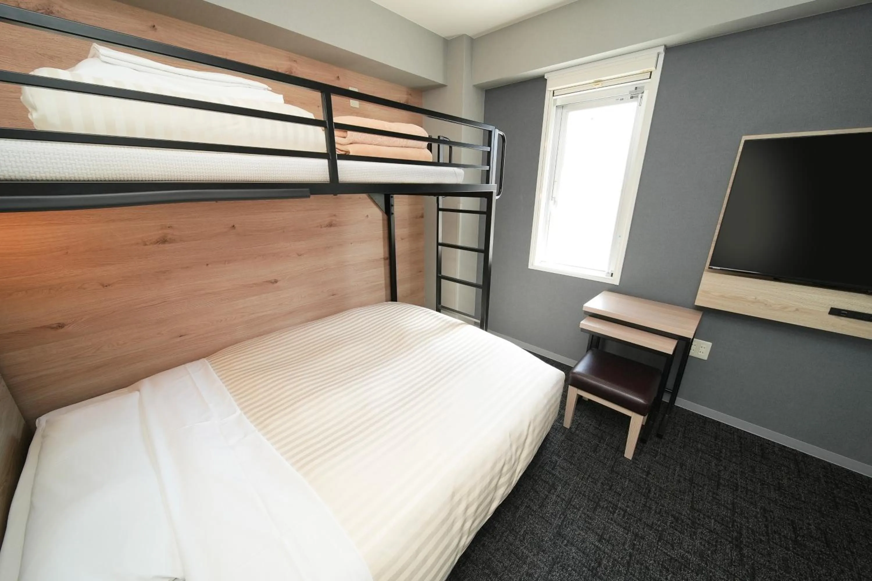 Bed in Super Hotel Utsunomiya