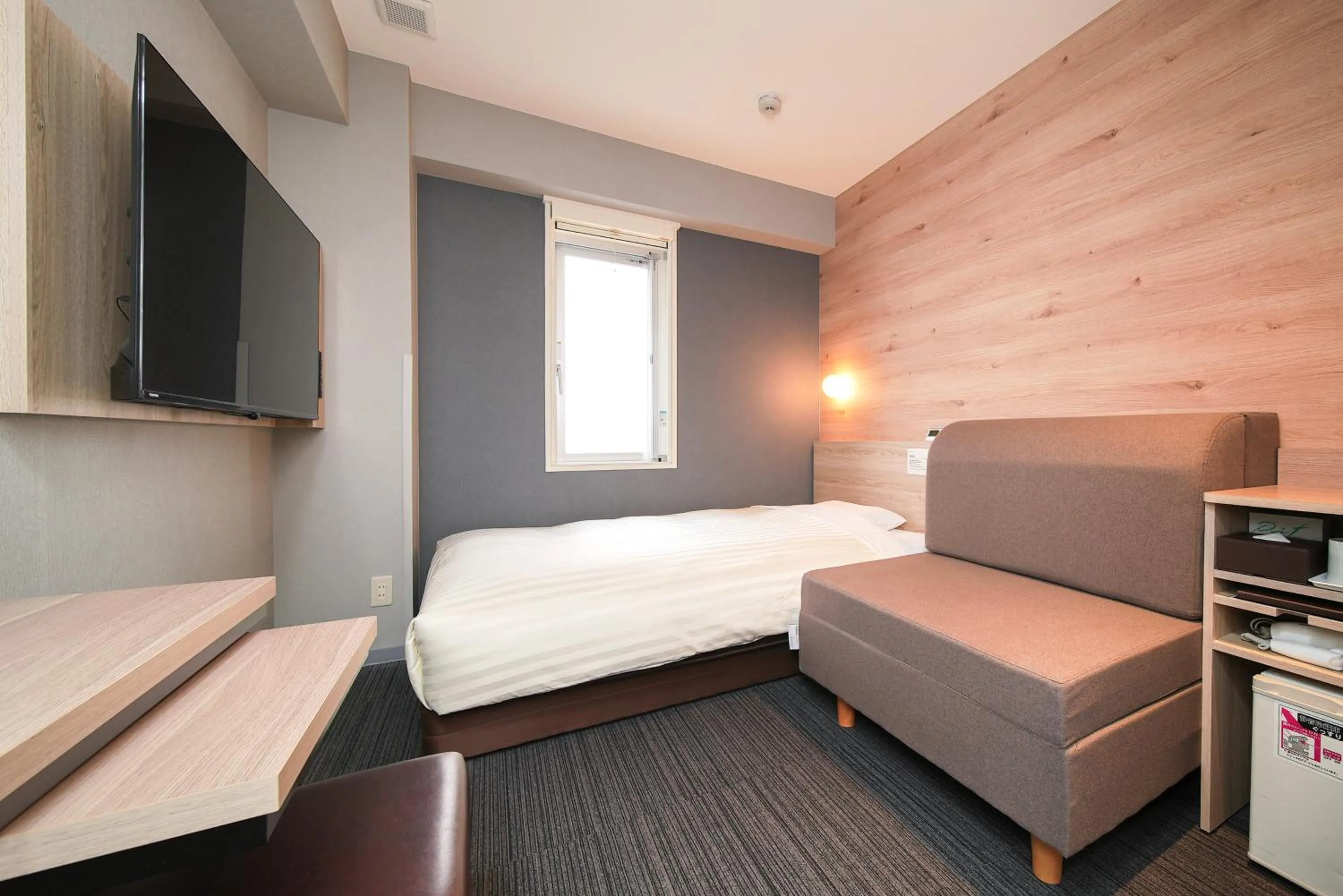 Bed in Super Hotel Utsunomiya