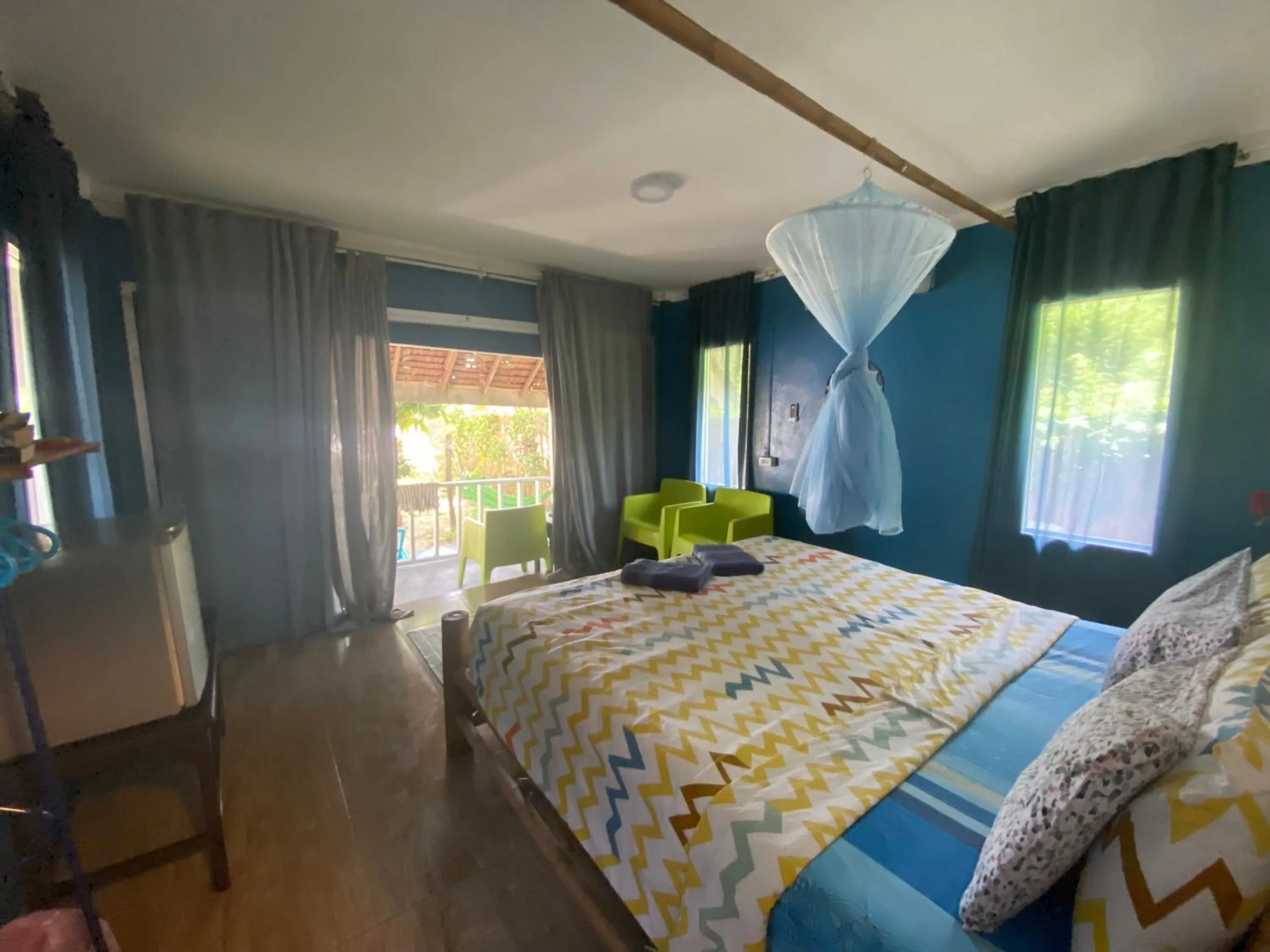 Photo of the whole room, Bed in Secret Beach Bungalows
