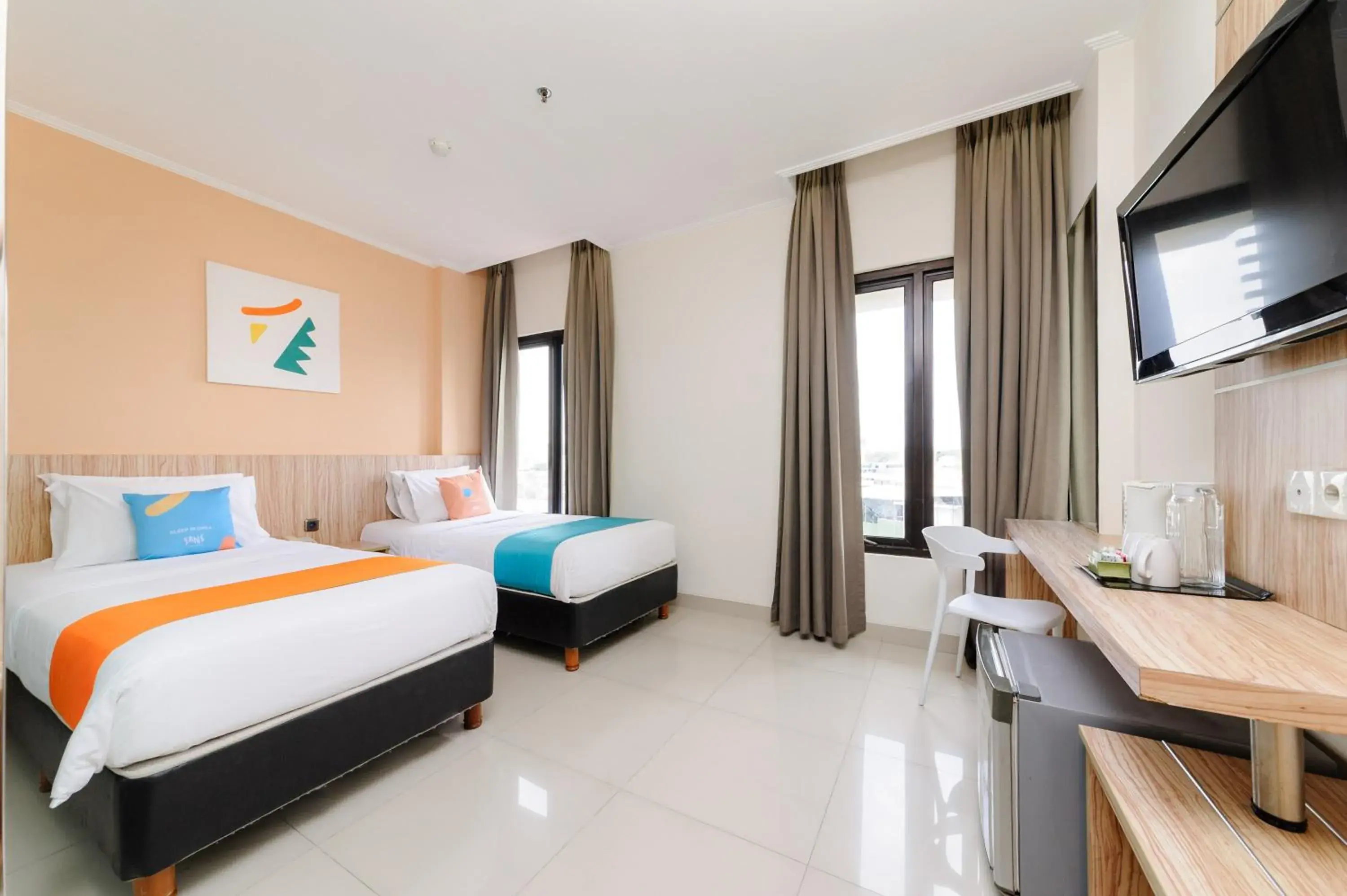Deluxe Twin Room in Sans Hotel The Green Bekasi by RedDoorz Deluxe Twin Room in Sans Hotel The Green Bekasi by RedDoorz