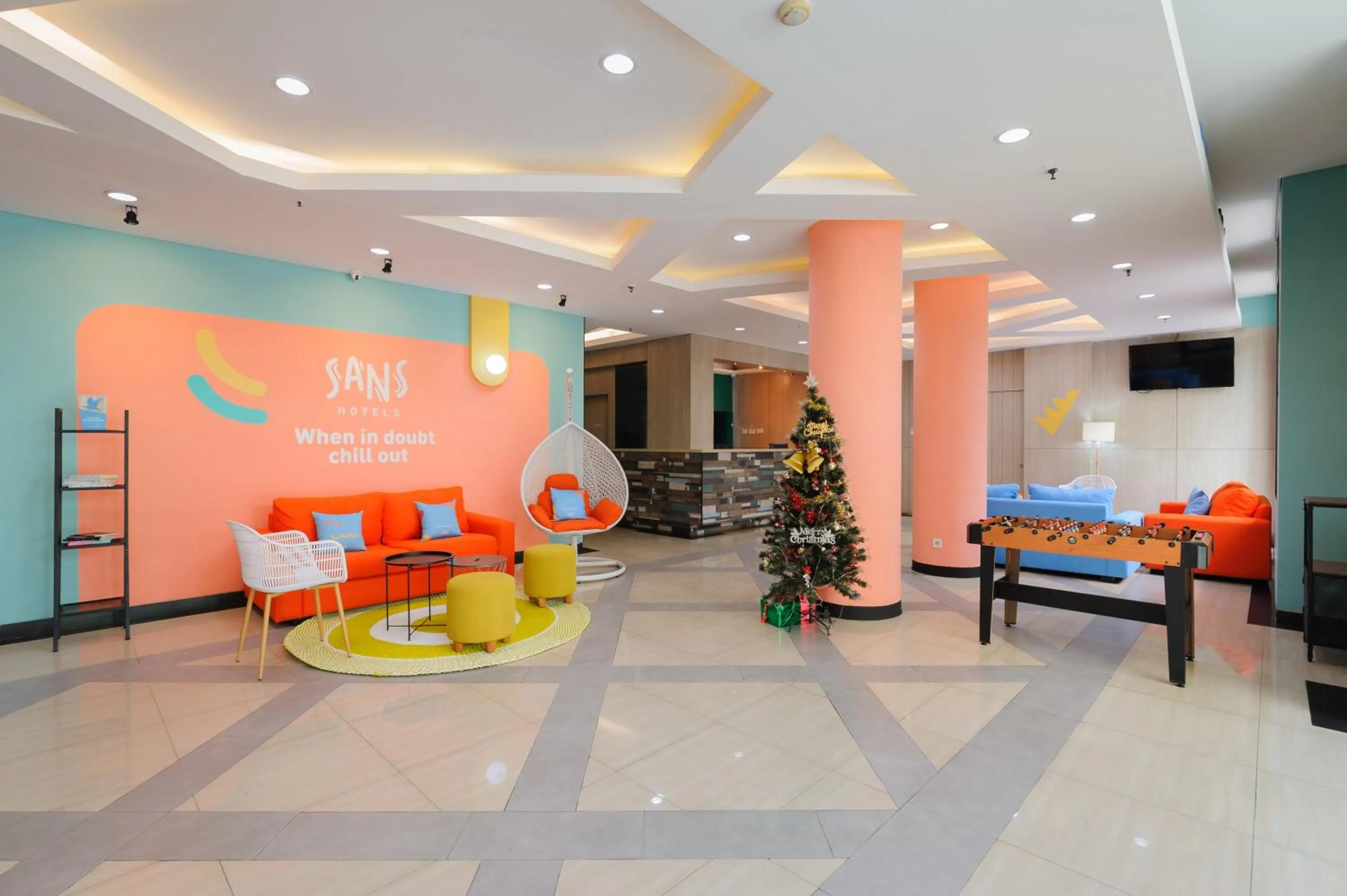 Lobby or reception in Sans Hotel The Green Bekasi by RedDoorz