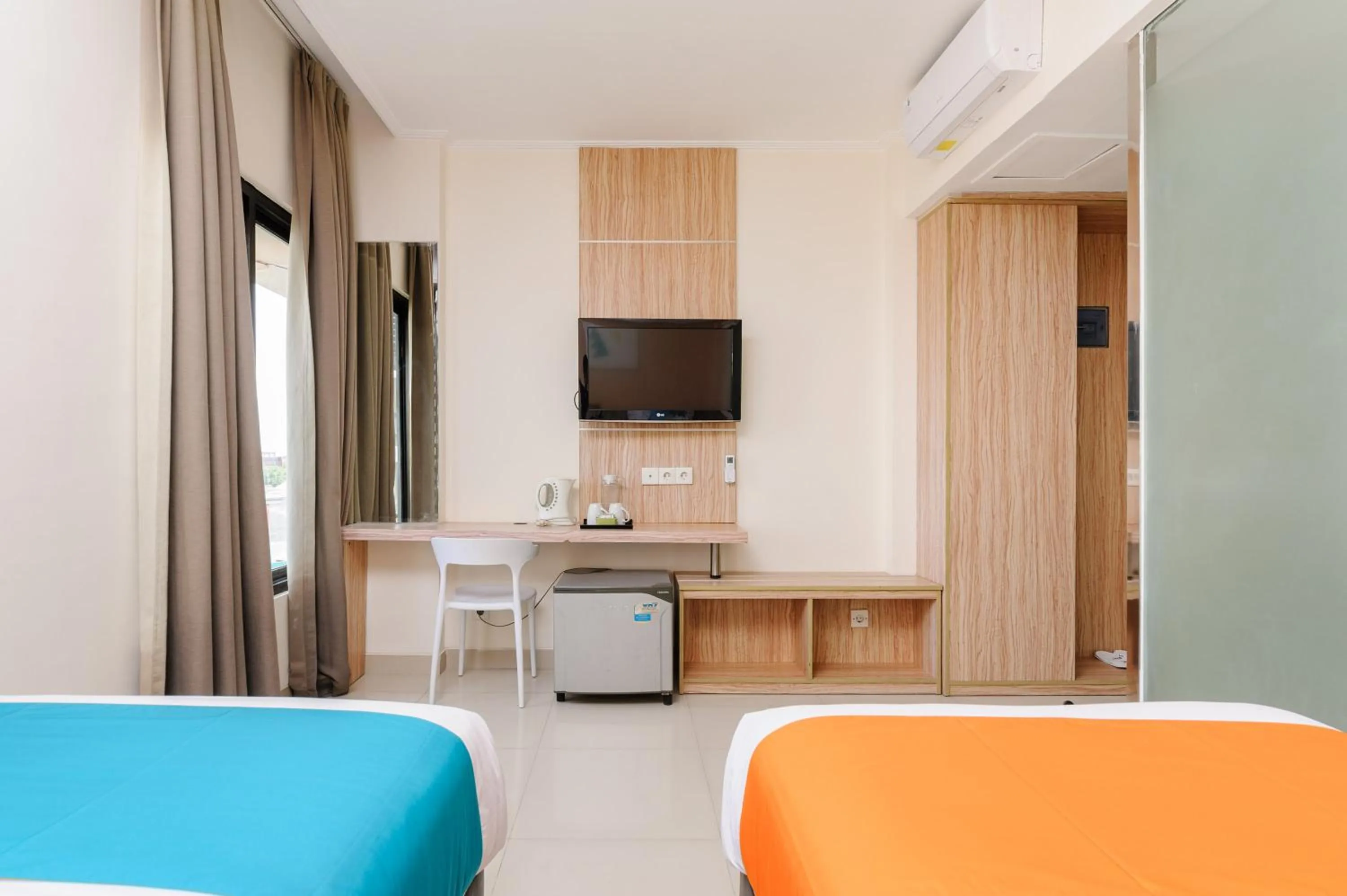 Bedroom in Sans Hotel The Green Bekasi by RedDoorz