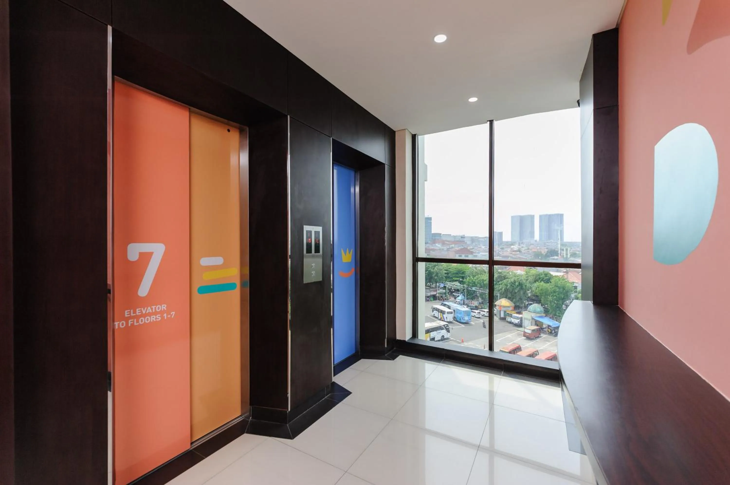 elevator in Sans Hotel The Green Bekasi by RedDoorz