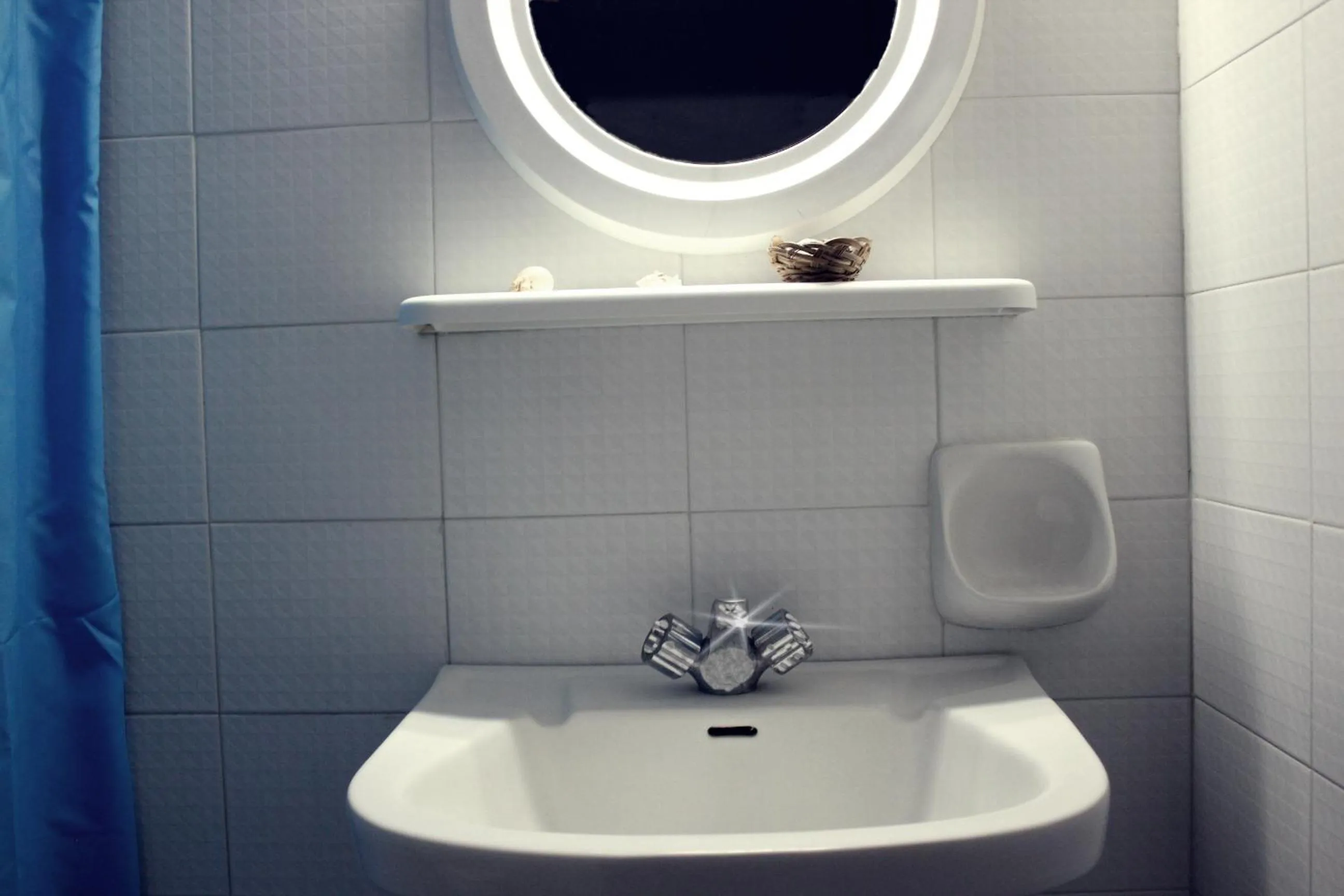 Bathroom in Elga Hotel & apartments