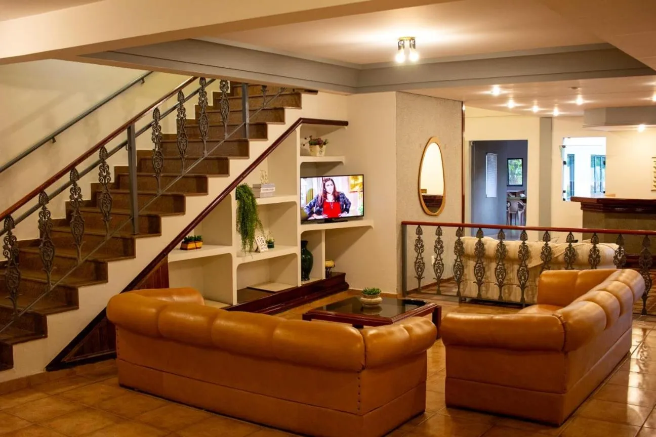 Communal lounge/ TV room in Hotel Aurora