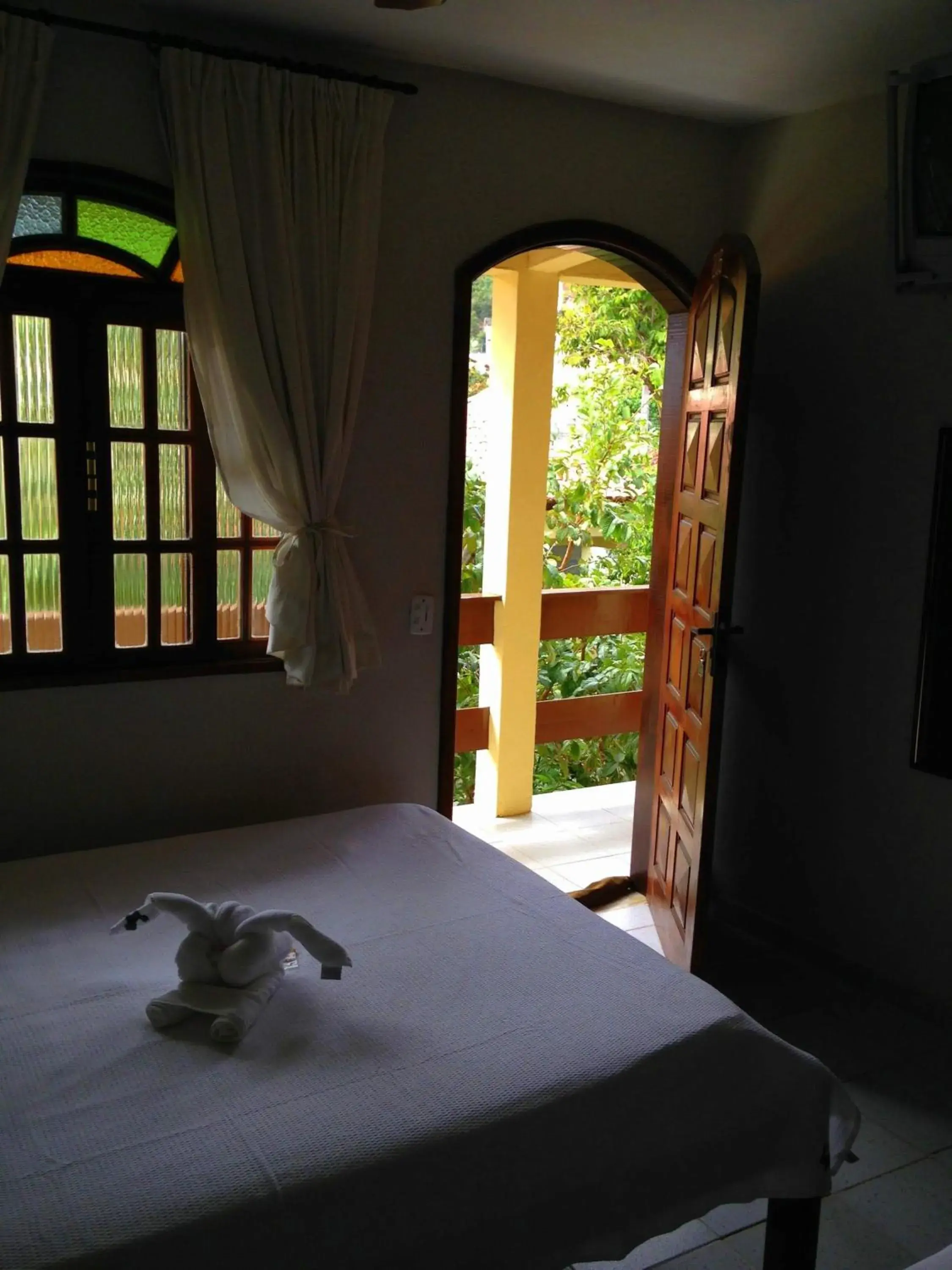 Triple Room with Garden View in Pousada Toca dos Coelhos Triple Room with Garden View in Pousada Toca dos Coelhos