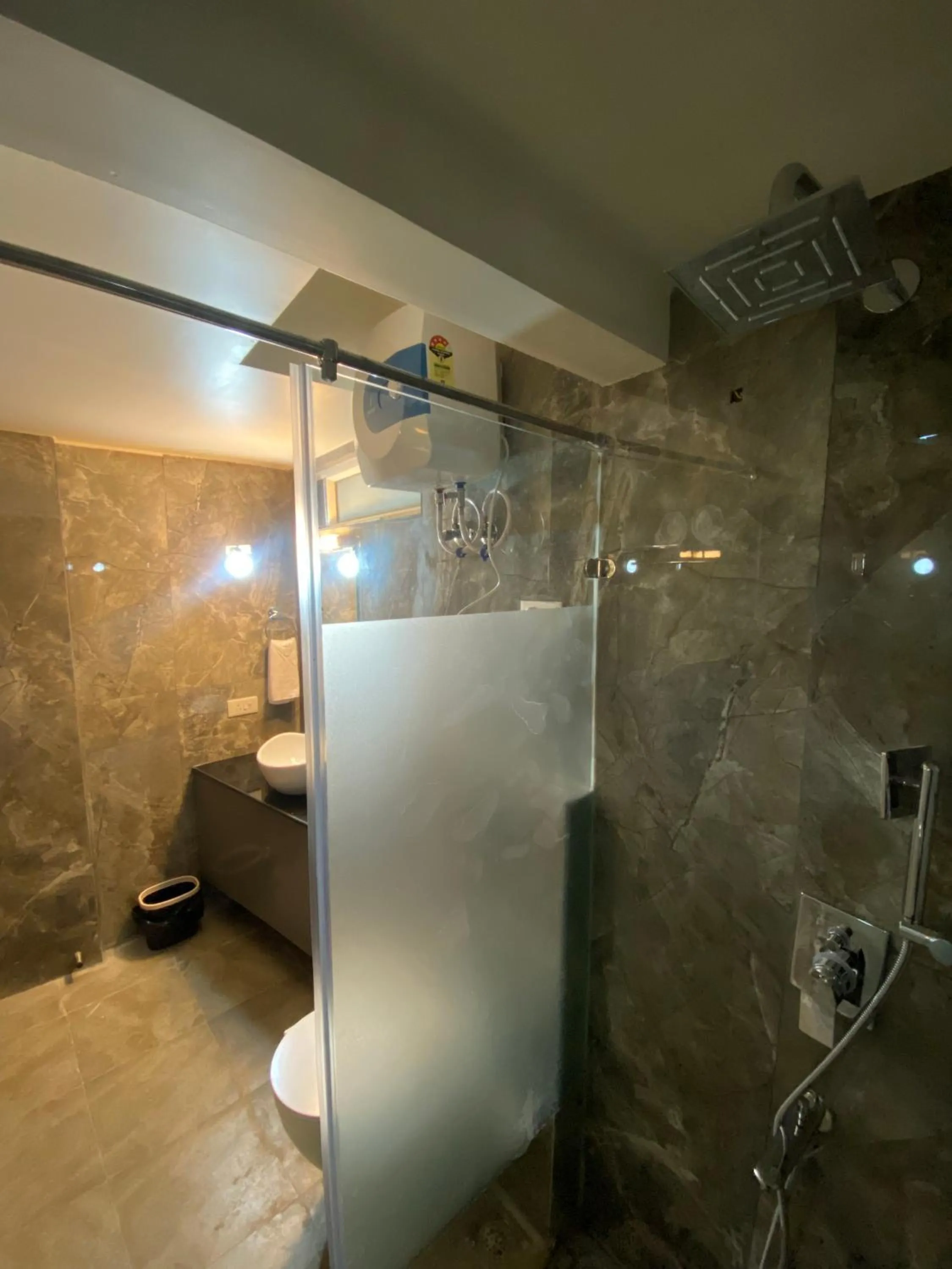 Shower in XCELSIOR HOTEL & SPA