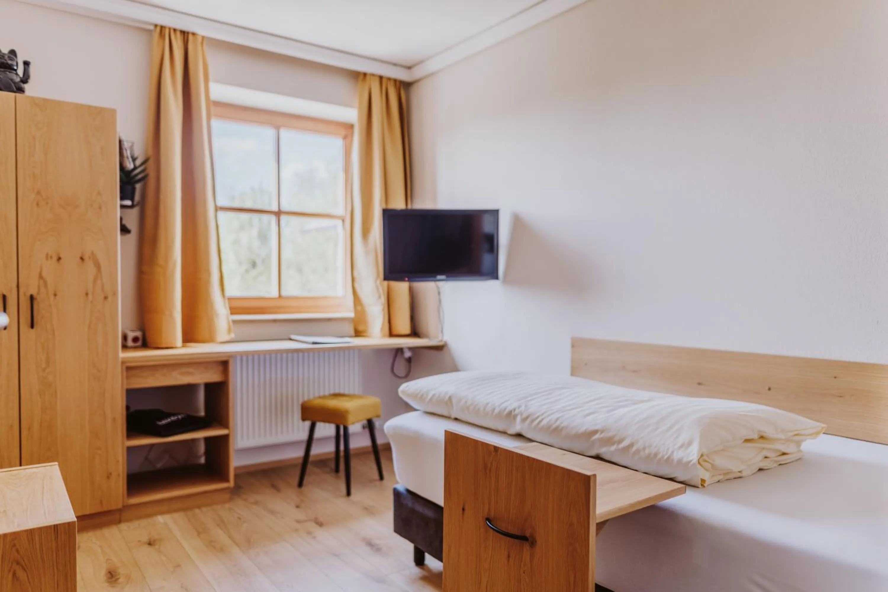 Photo of the whole room, Bed in Landhotel Gschirnwirt