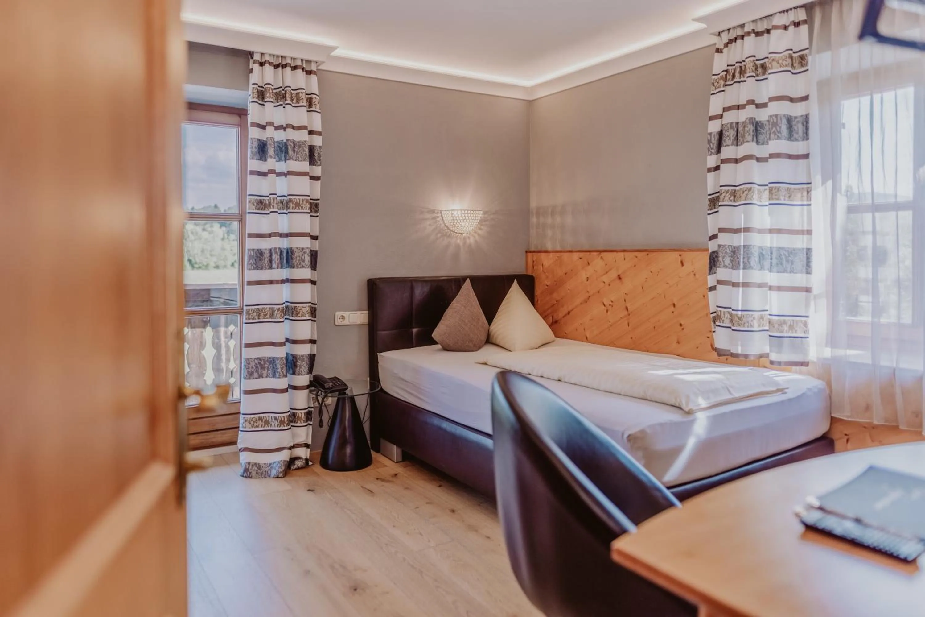 Photo of the whole room, Bed in Landhotel Gschirnwirt