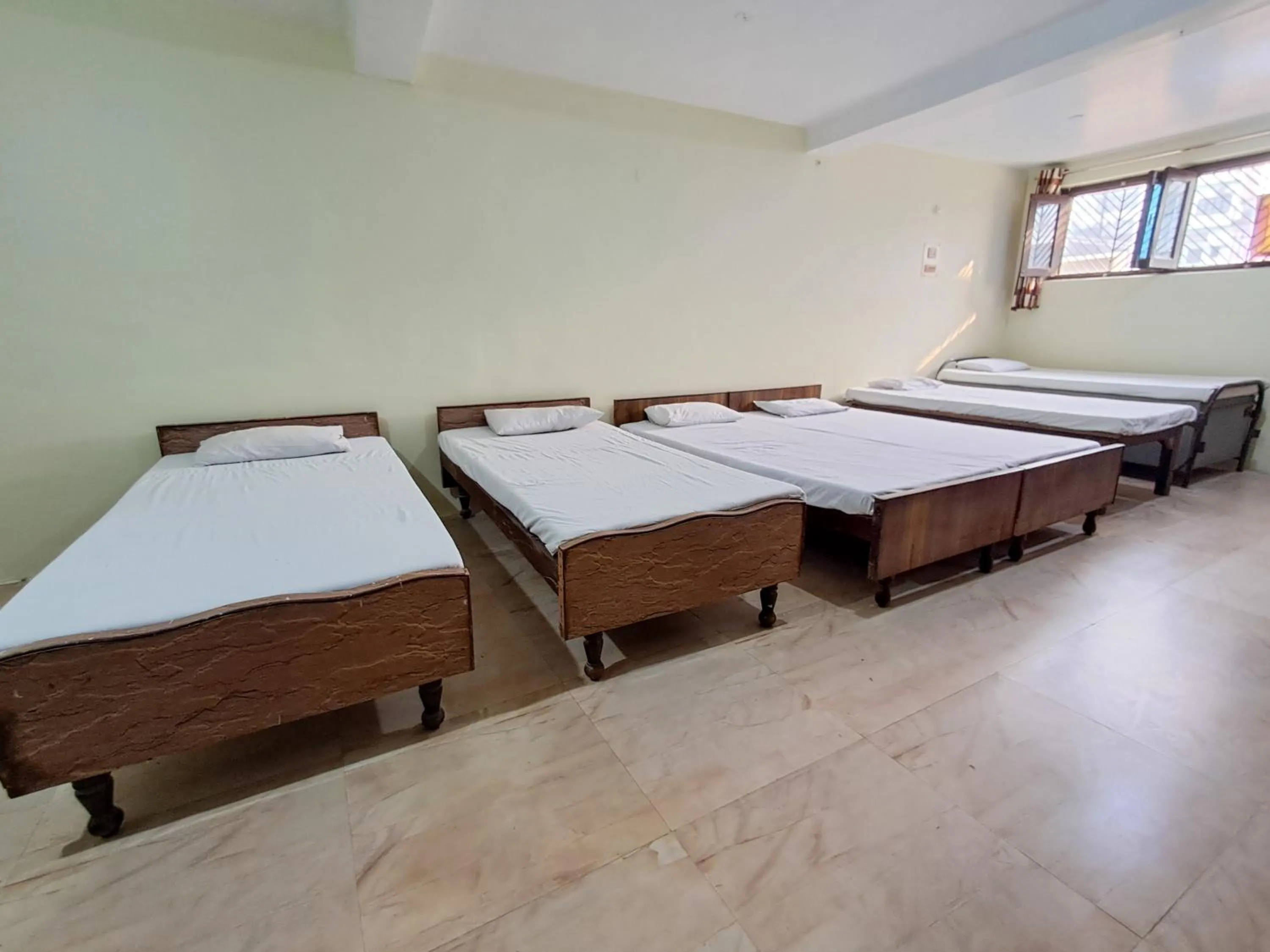 Bed in LD Guest House, Ayodhya