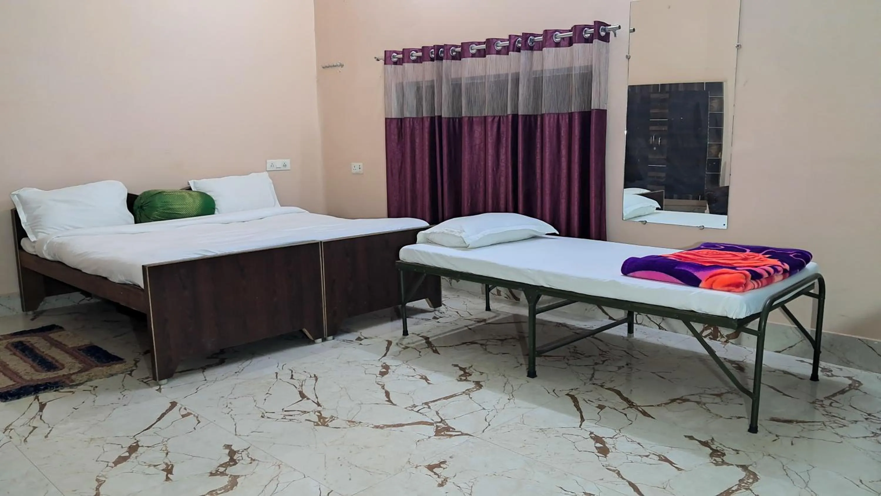 Bed in LD Guest House, Ayodhya