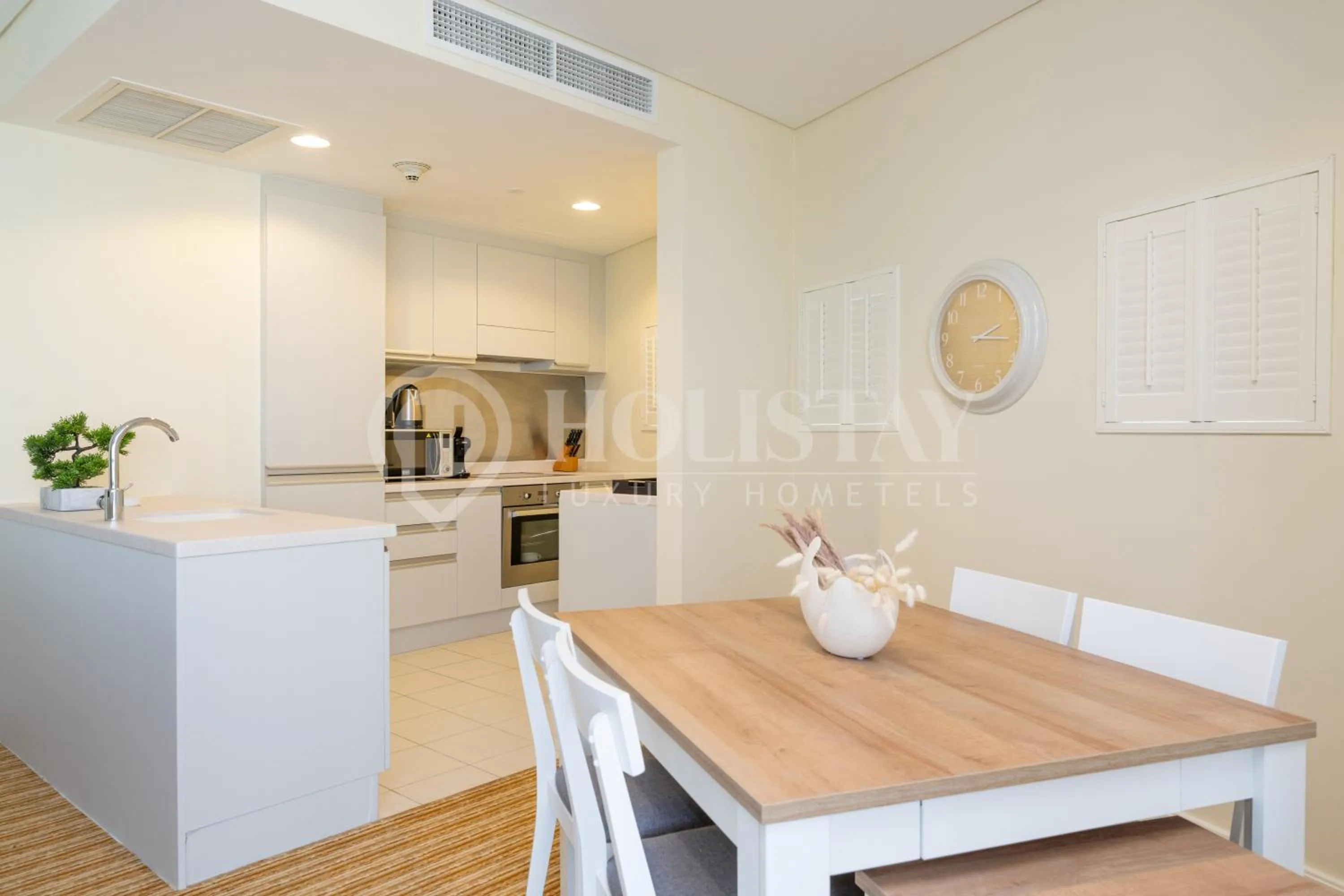 Dining area in Holistay Luxury Homes - Burj khalifa view - Direct Access Dubai Mall