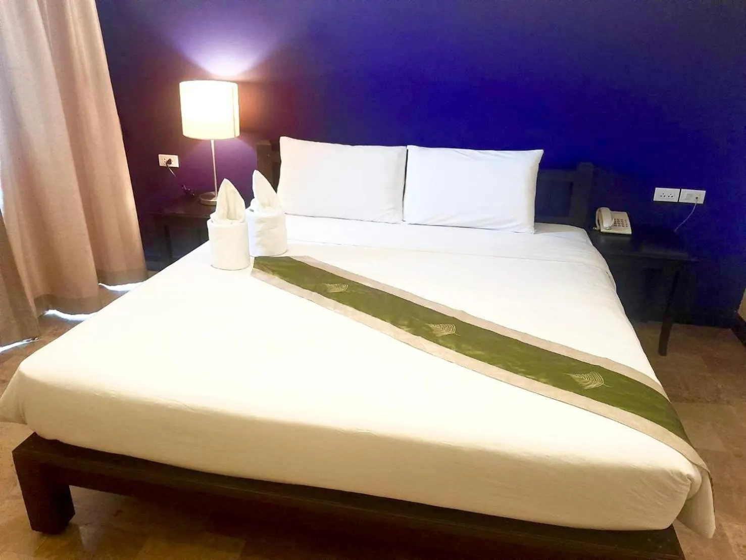 Bed in All Together Suite Hotel