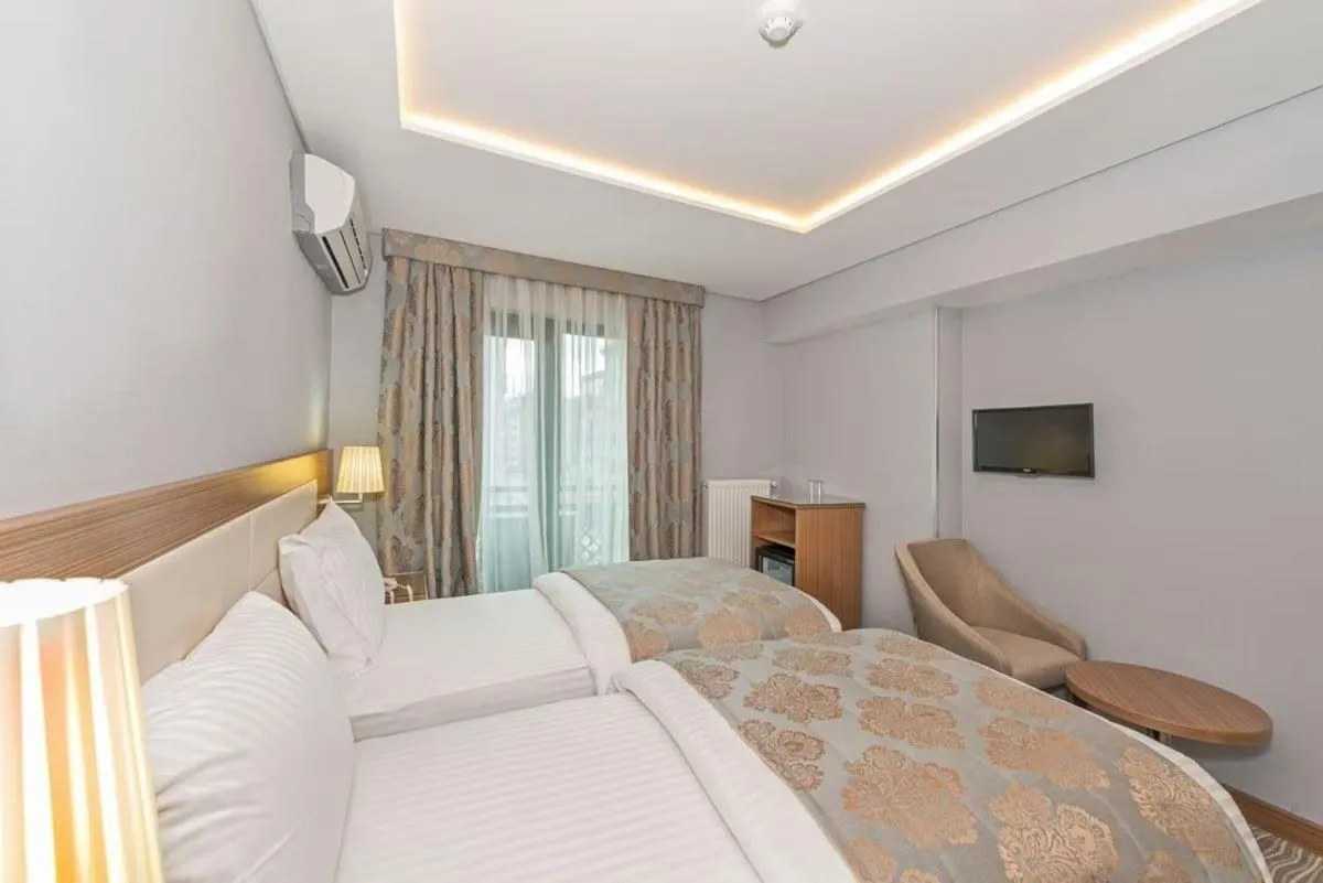 Bed in Floransa City Hotel