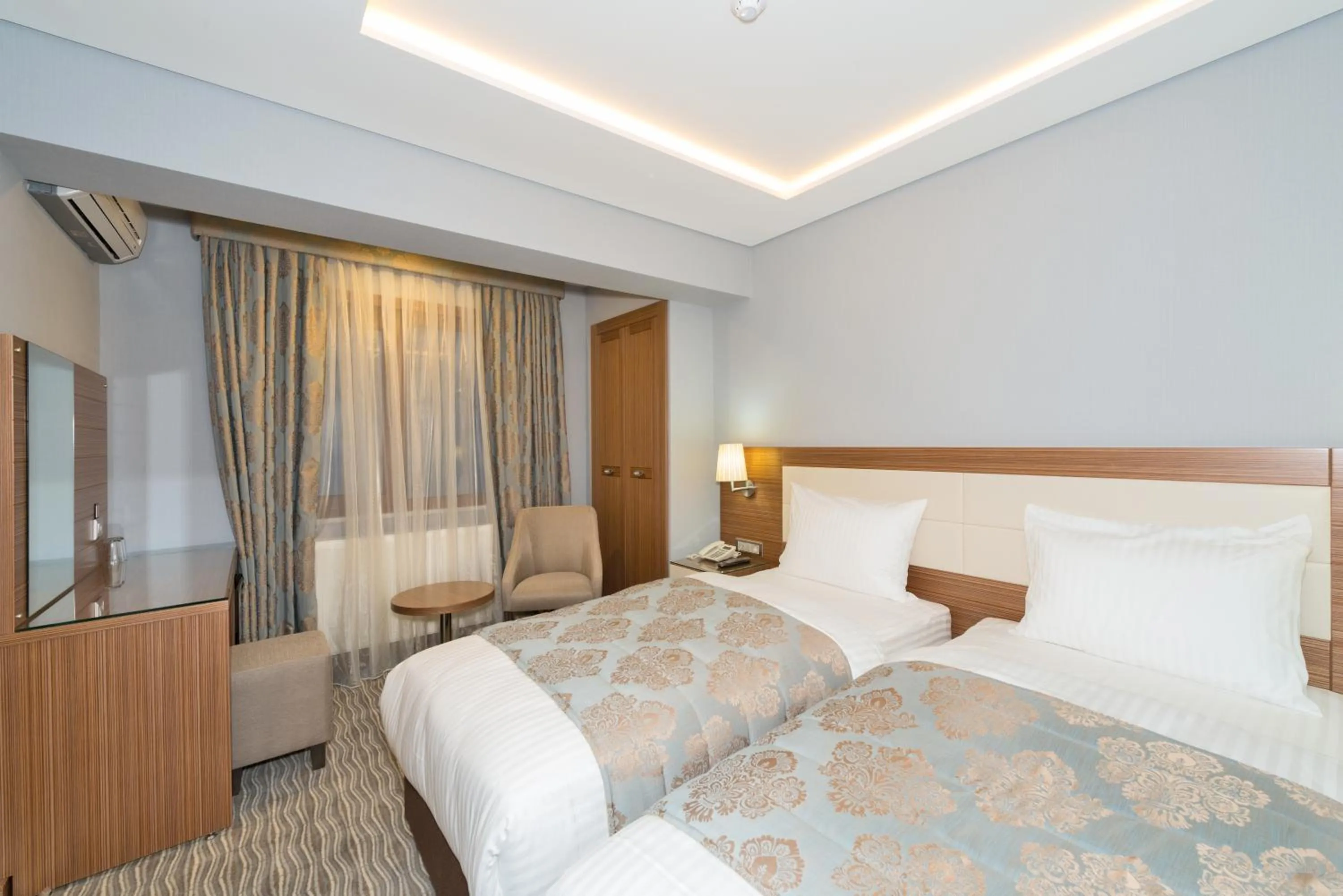 Bed in Floransa City Hotel