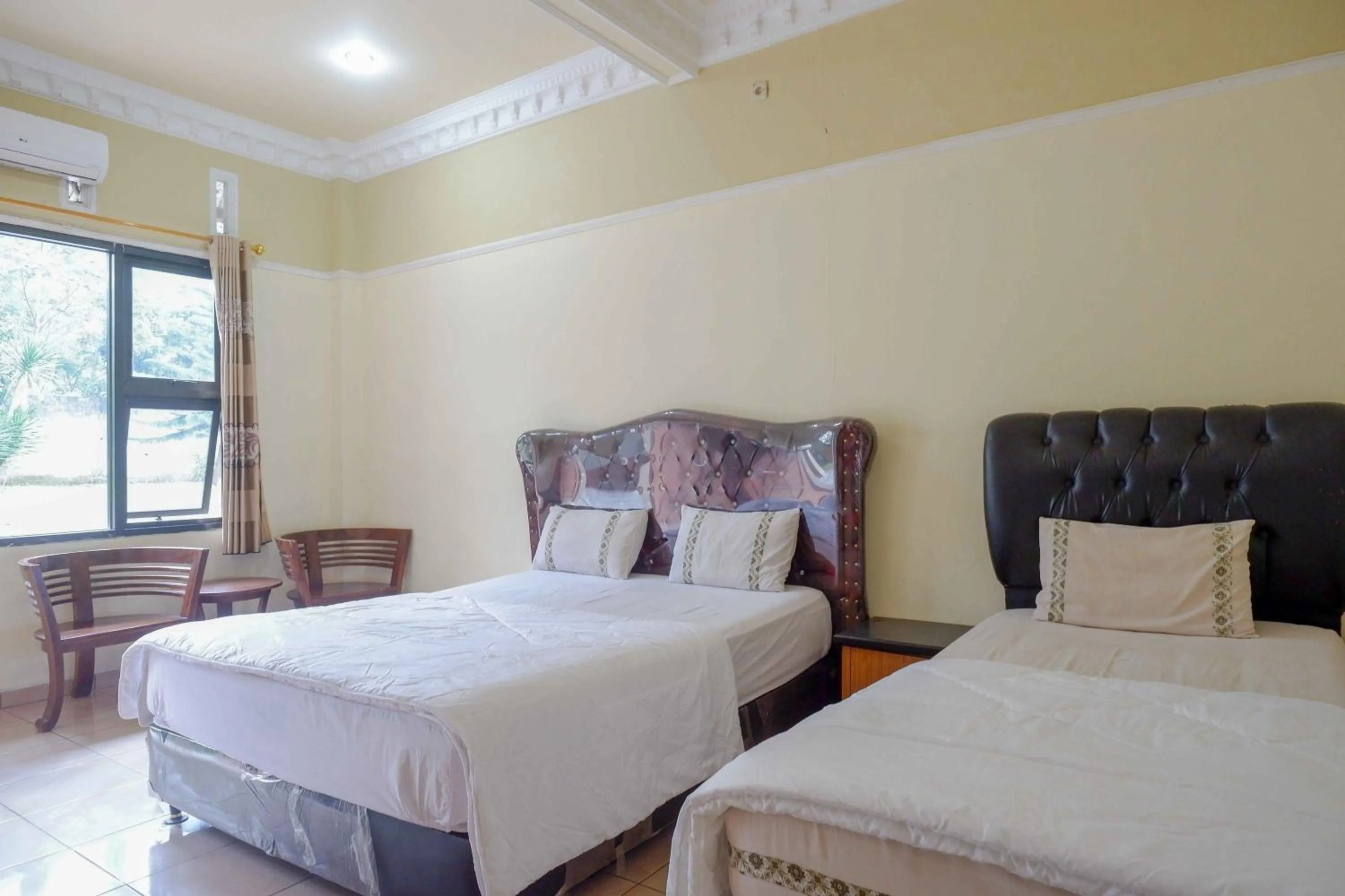 Bedroom, Bed in Urbanview Hotel Bergas Indah Bandungan by RedDoorz