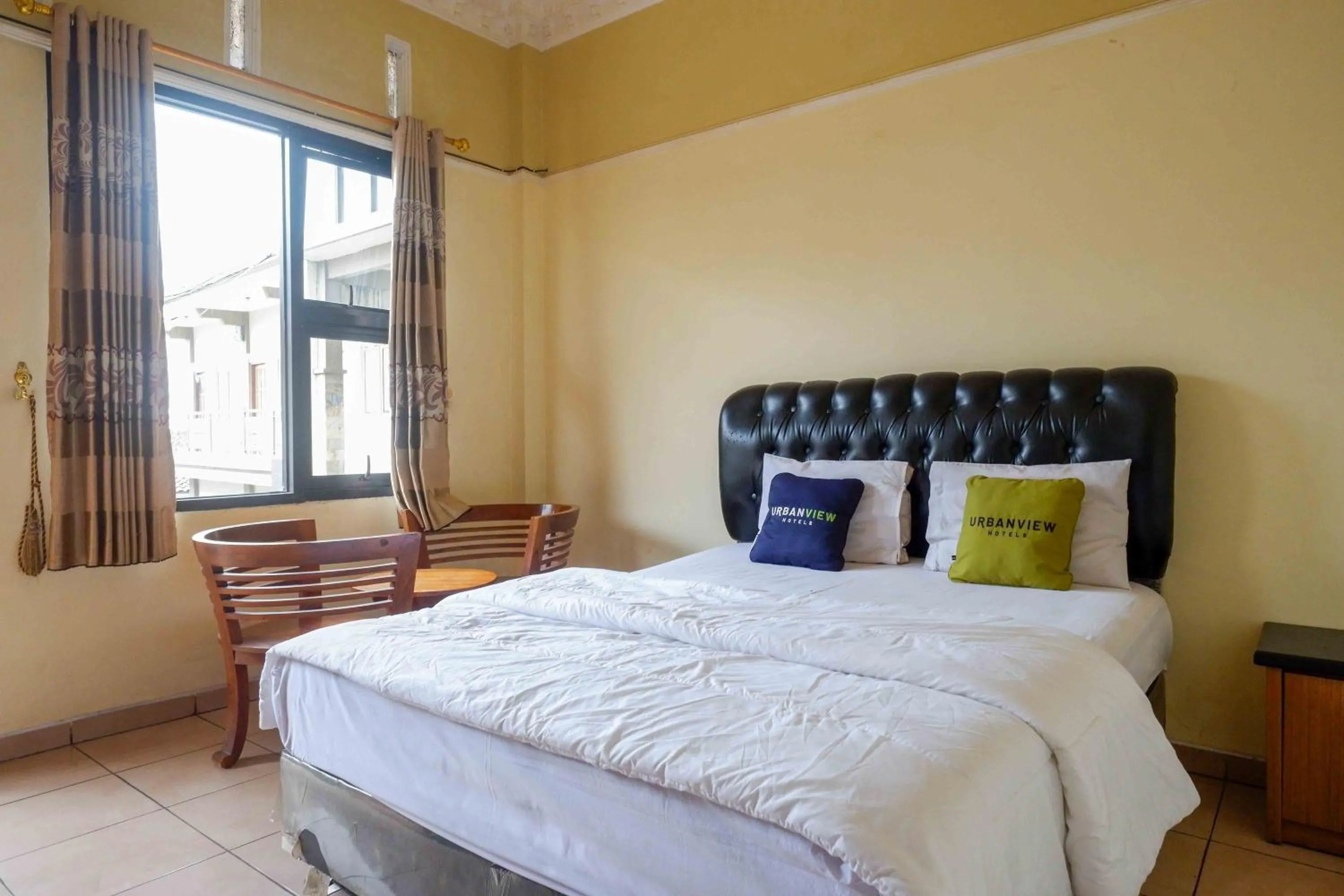 Bedroom, Bed in Urbanview Hotel Bergas Indah Bandungan by RedDoorz