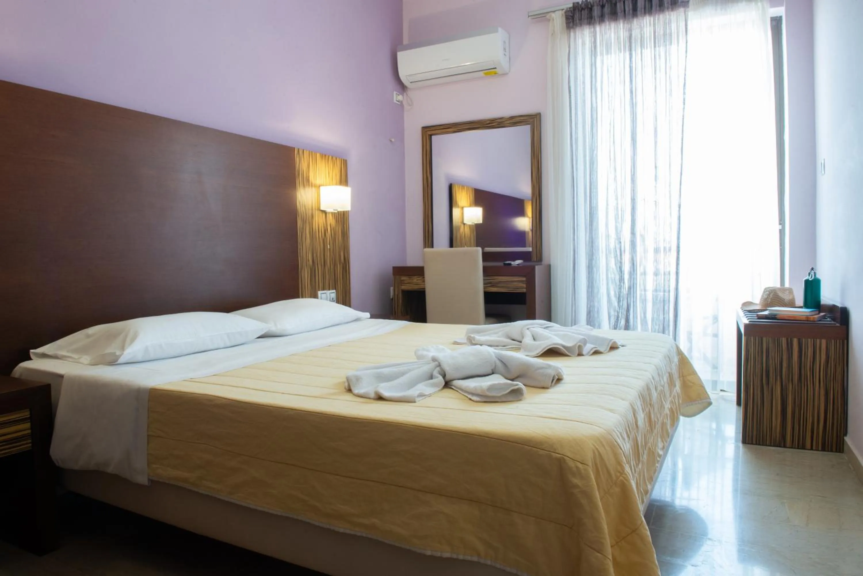 Bed in GOLDEN SUN Κokkoni Beach Hotel