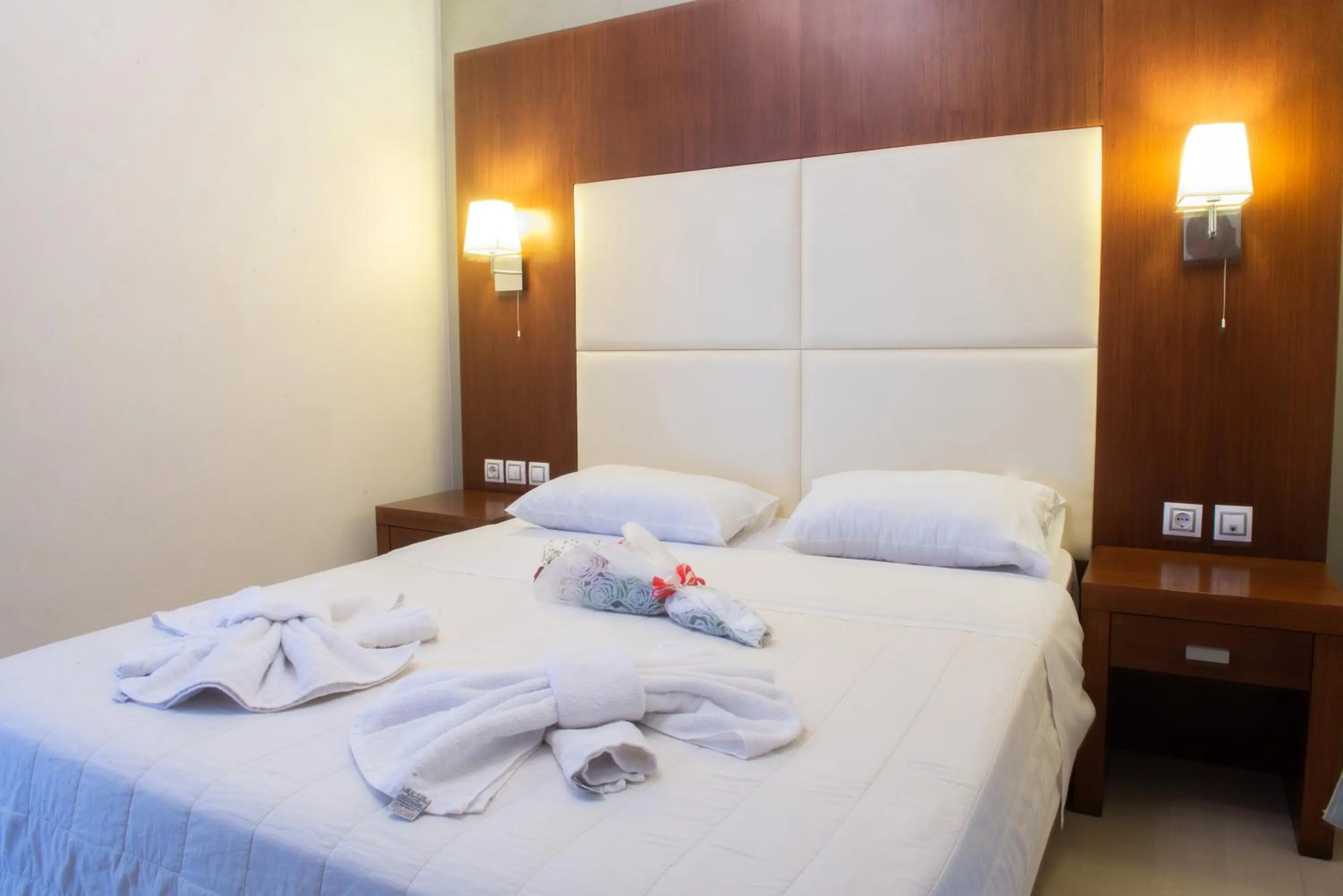 Bed in GOLDEN SUN Κokkoni Beach Hotel