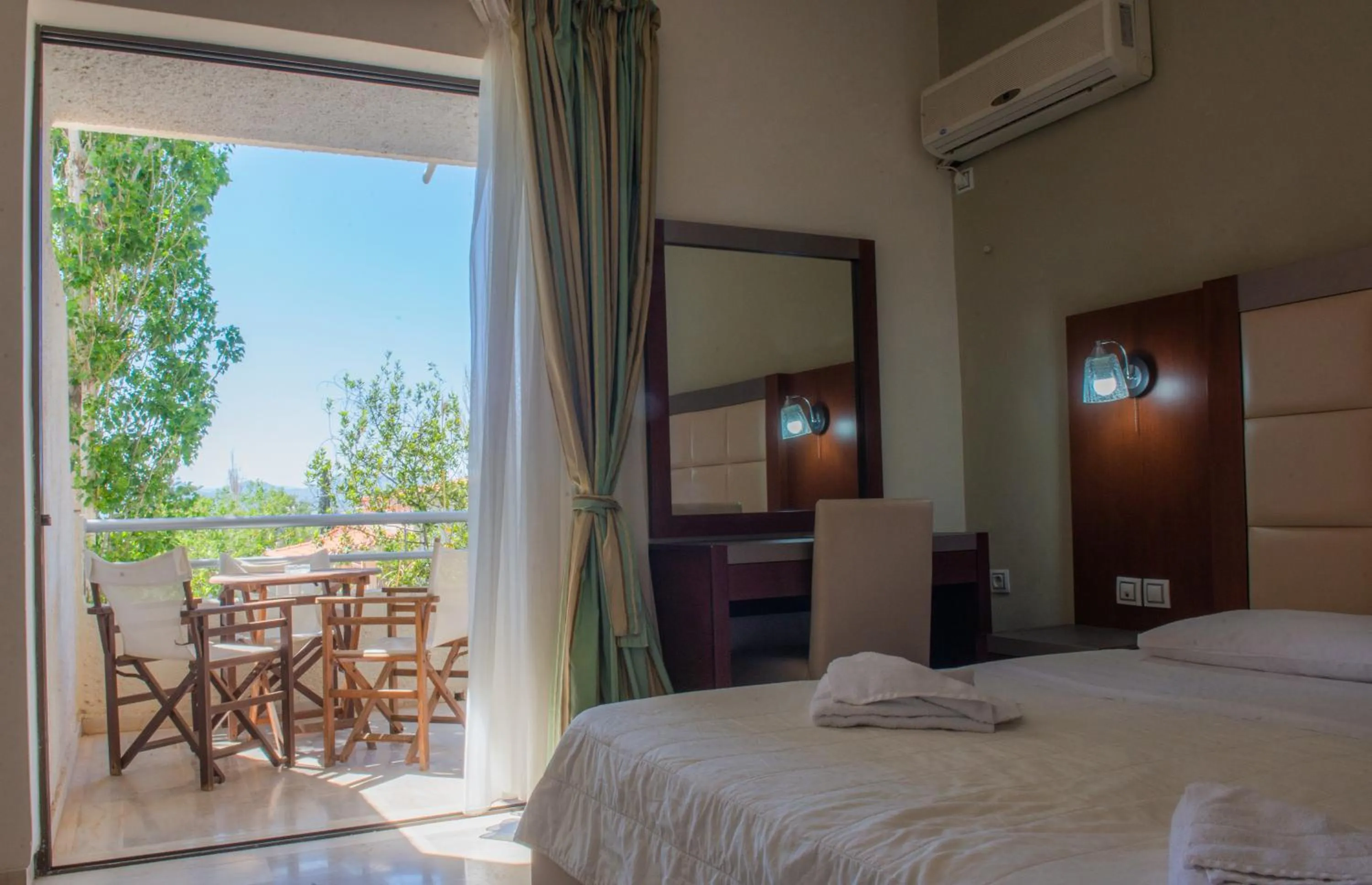 Bed in GOLDEN SUN Κokkoni Beach Hotel