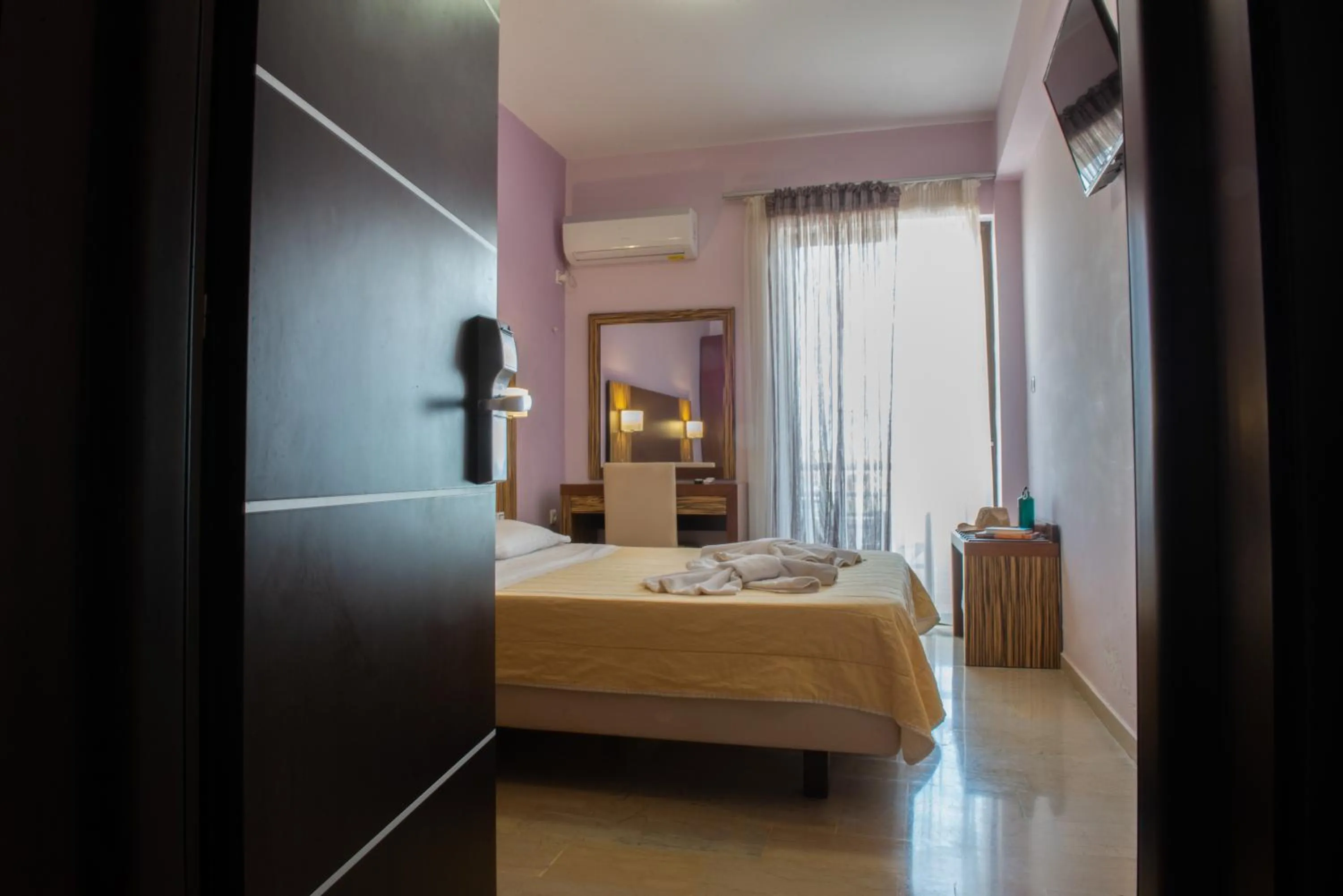 Bed in GOLDEN SUN Κokkoni Beach Hotel