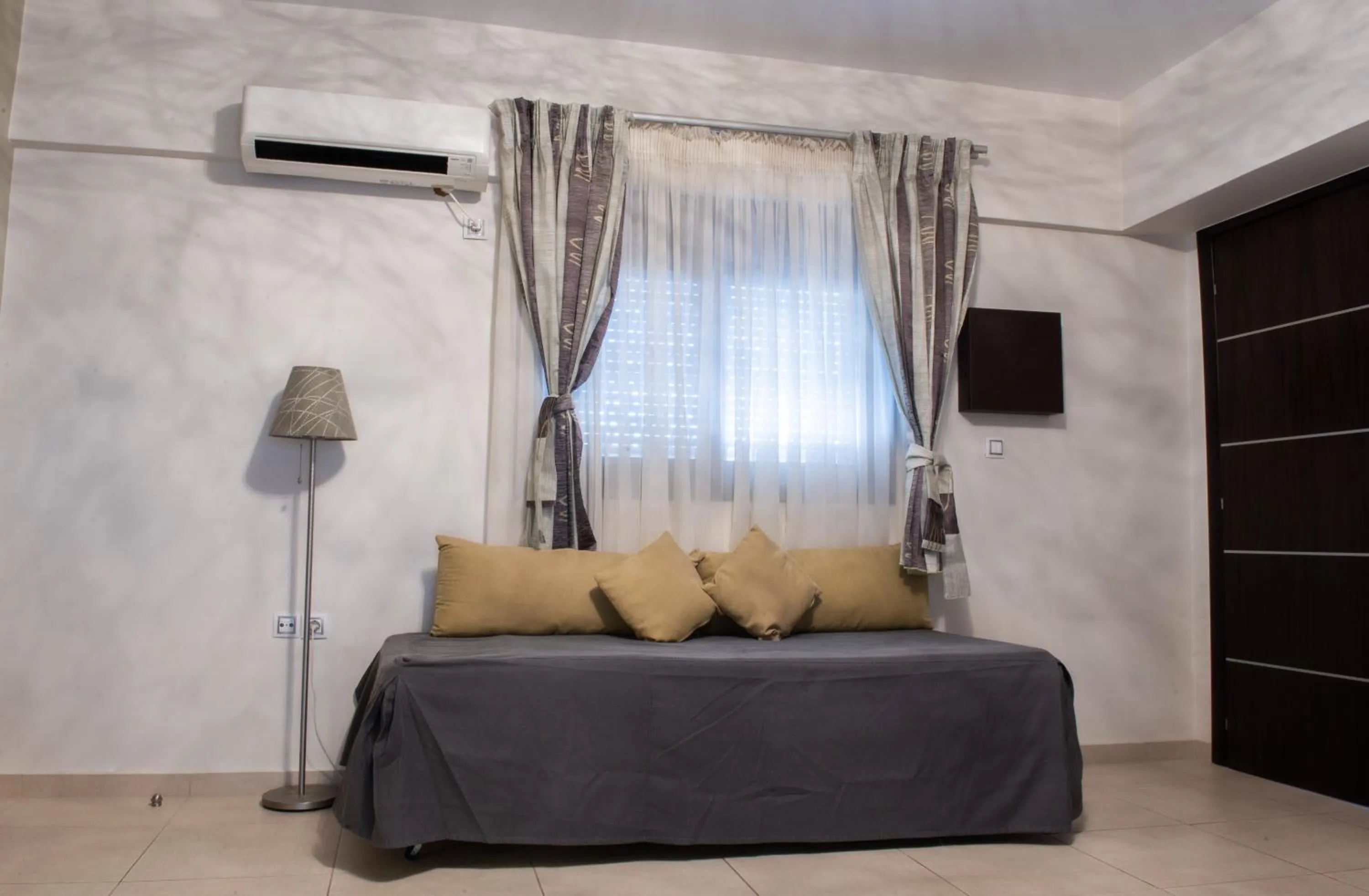 Bed in GOLDEN SUN Κokkoni Beach Hotel