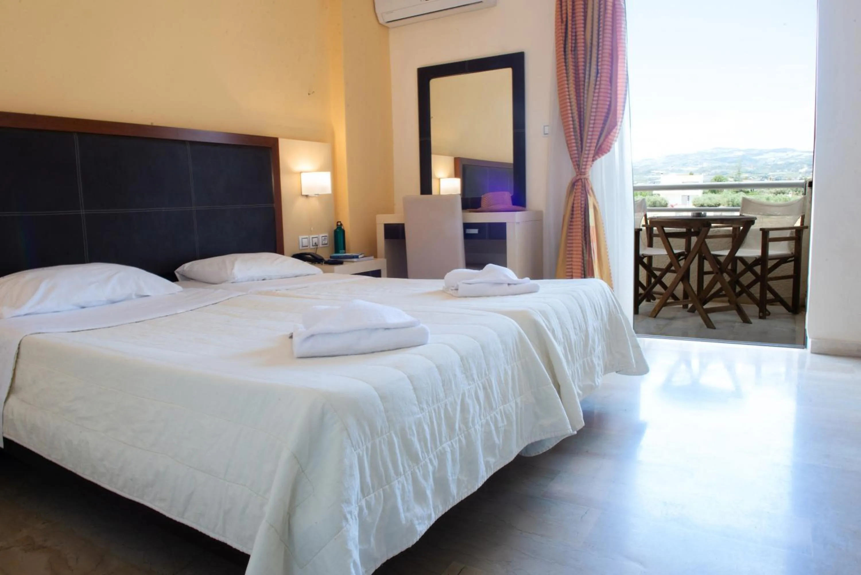 Bed in GOLDEN SUN Κokkoni Beach Hotel