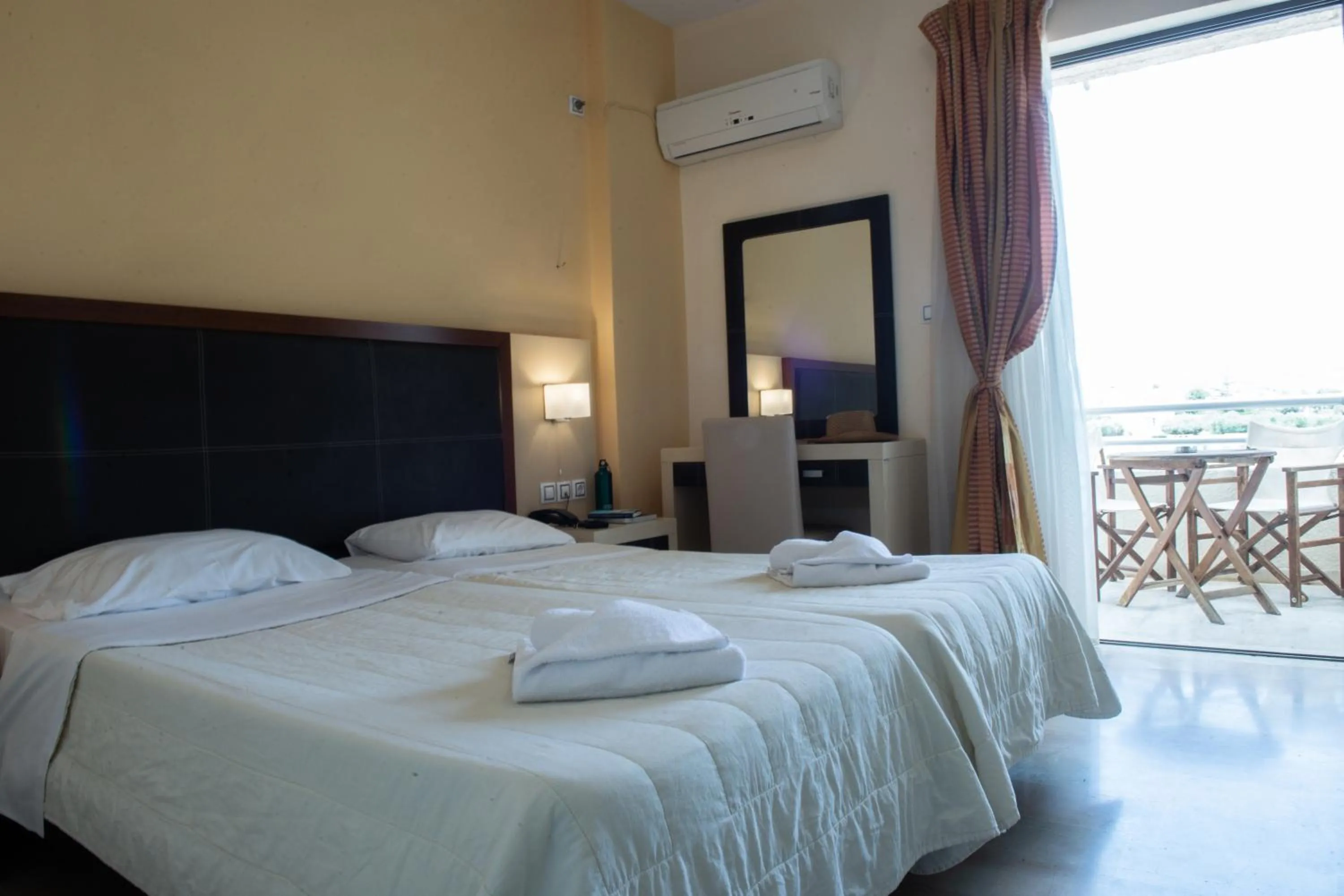 Bed in GOLDEN SUN Κokkoni Beach Hotel